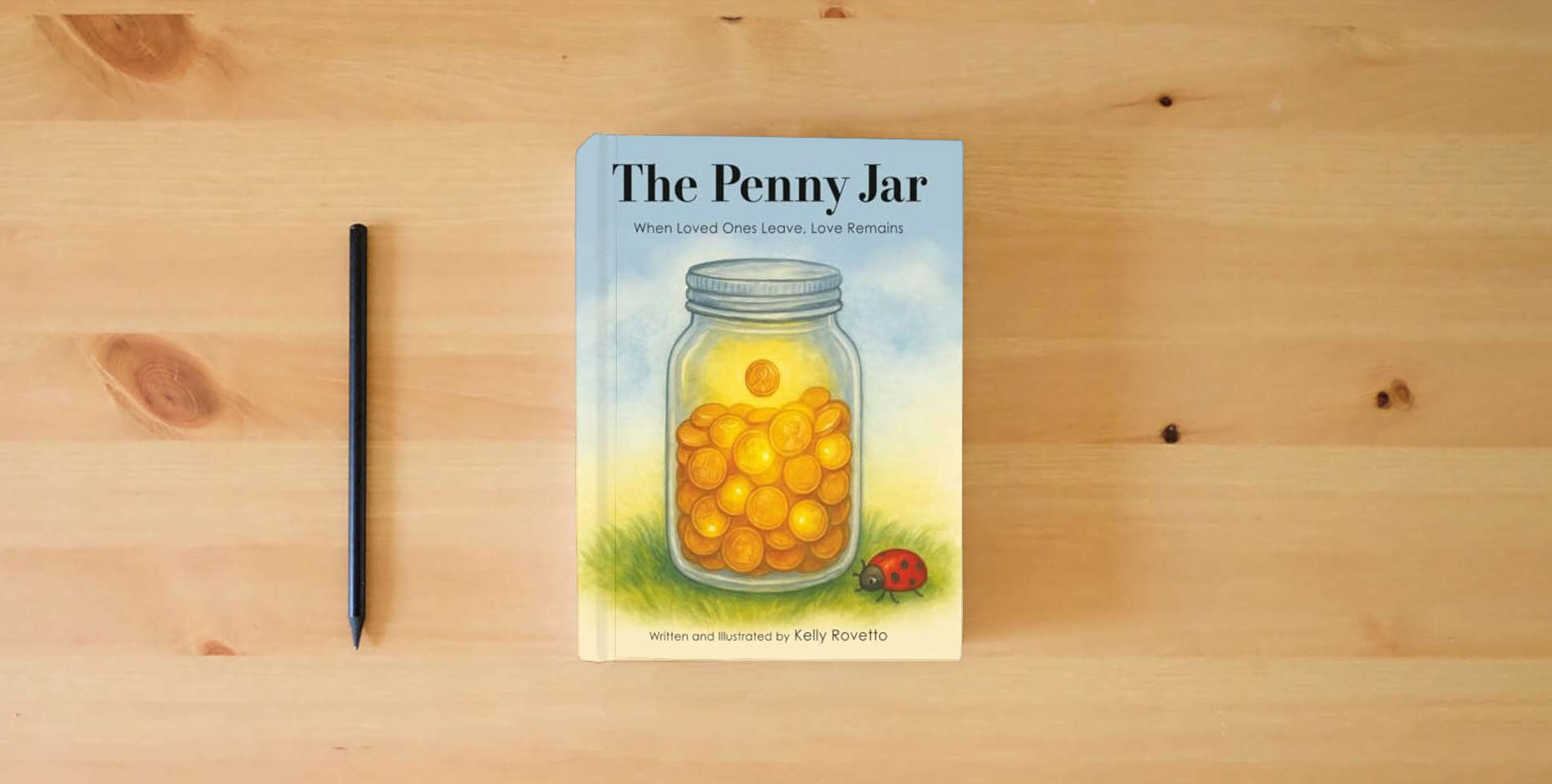 The book The Penny Jar: When Loved Ones Leave, Love Remains is on the table