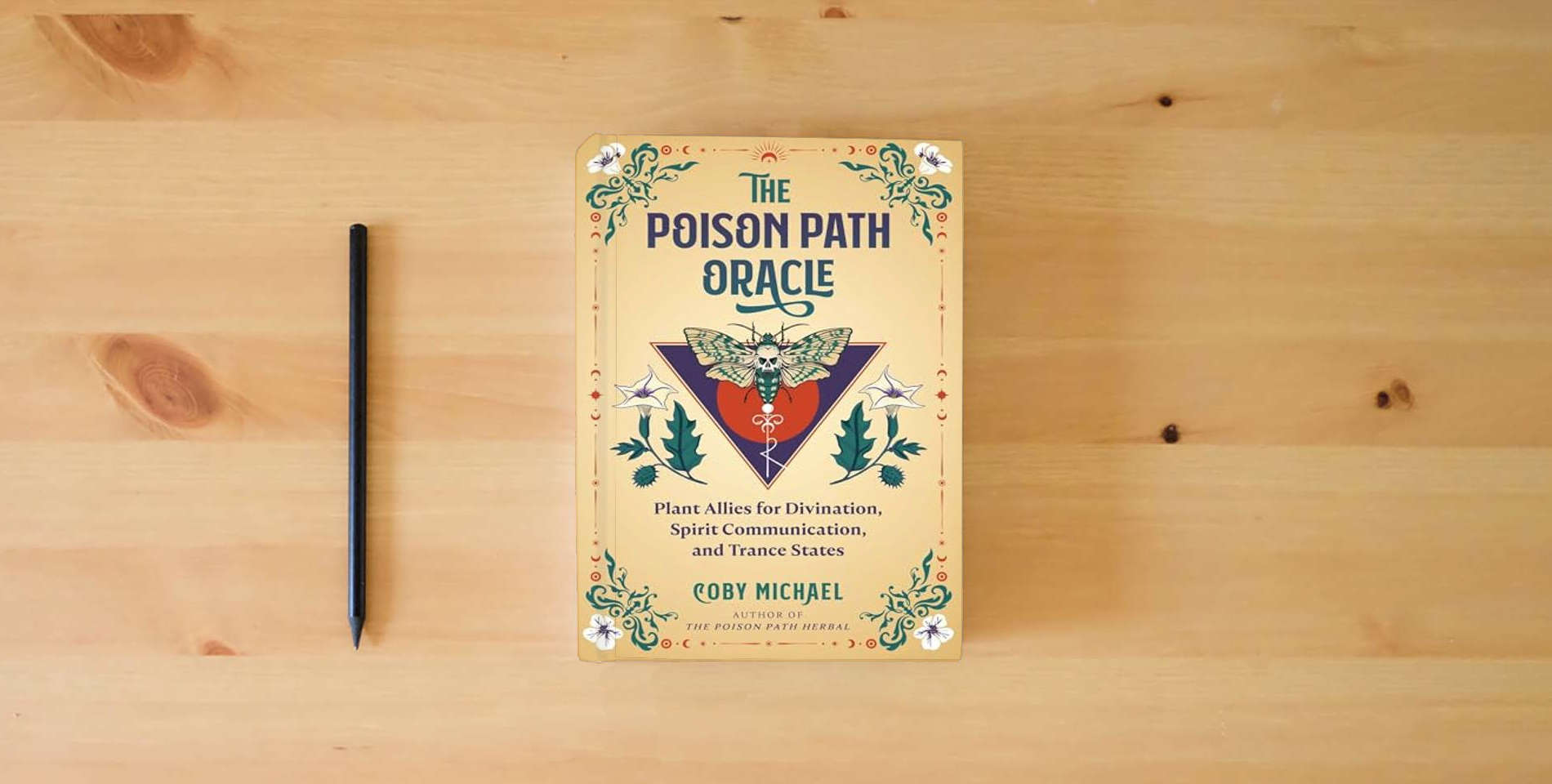The book The Poison Path Oracle: Plant Allies for Divination, Spirit Communication, and Trance States is on the table