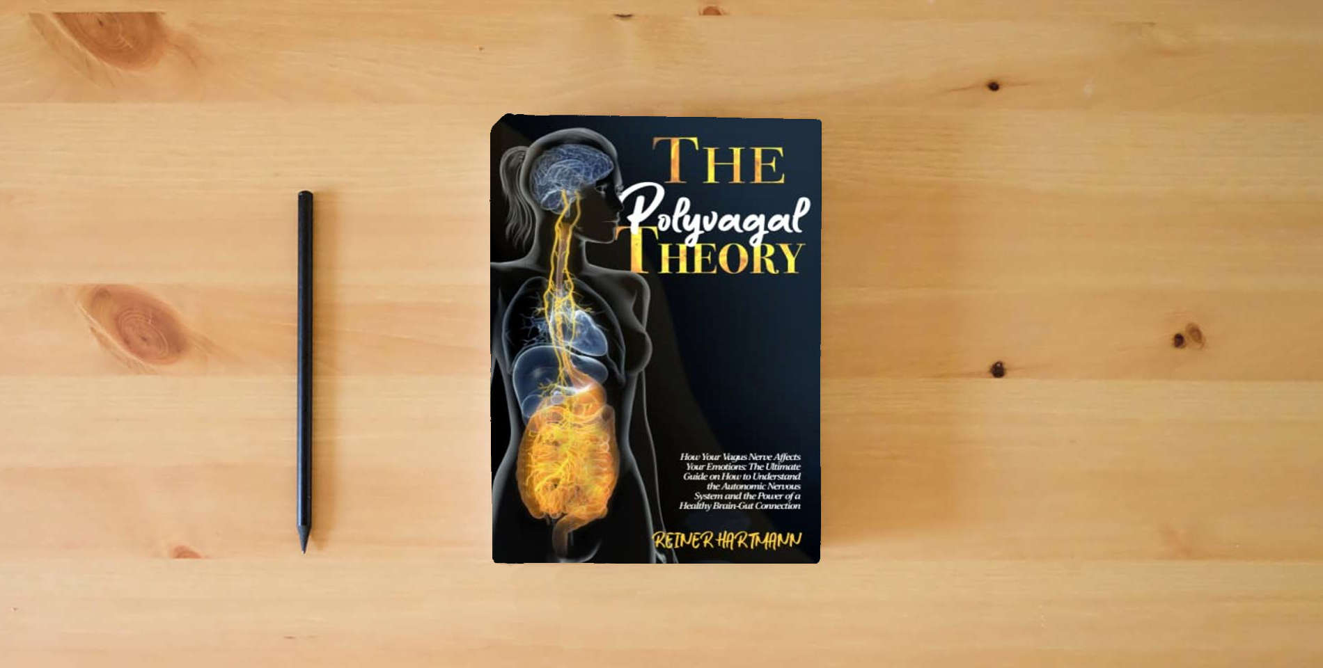 The book The Polyvagal Theory: How Your Vagus Nerve Affects Your Emotions: The Ultimate Guide on How to Understand the Autonomic Nervous System and the Power ... Mindset: Understanding the Polyvagal Theory) is on the table