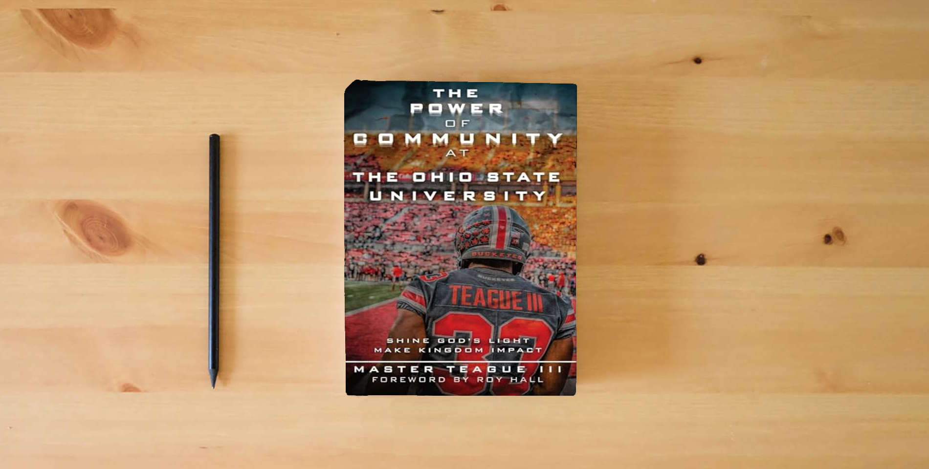 The book The Power Of Community At The Ohio State University: Shine God's Light Make Kingdom Impact is on the table