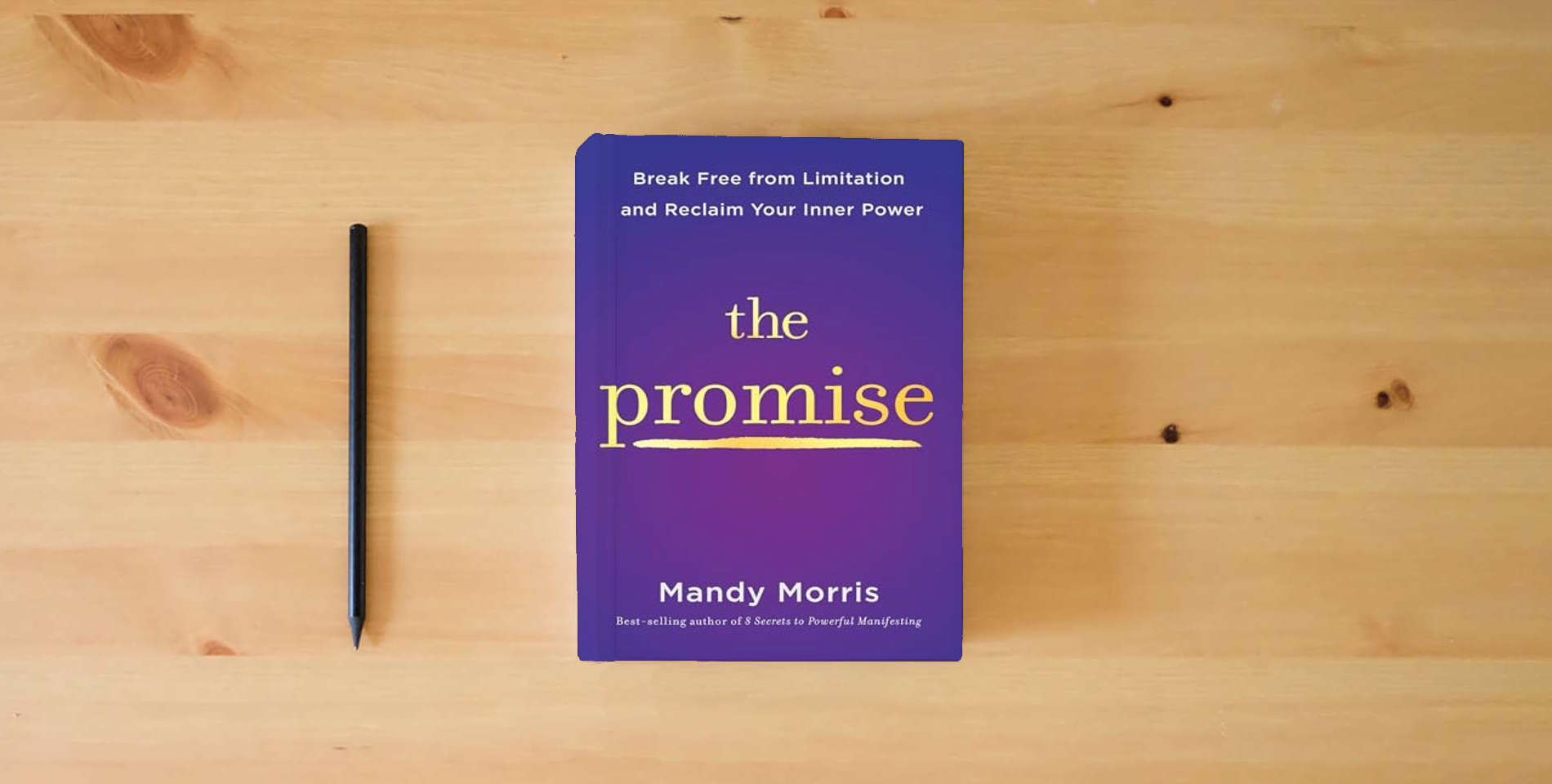 The book The Promise: Break Free from Limitation and Reclaim Your Inner Power is on the table