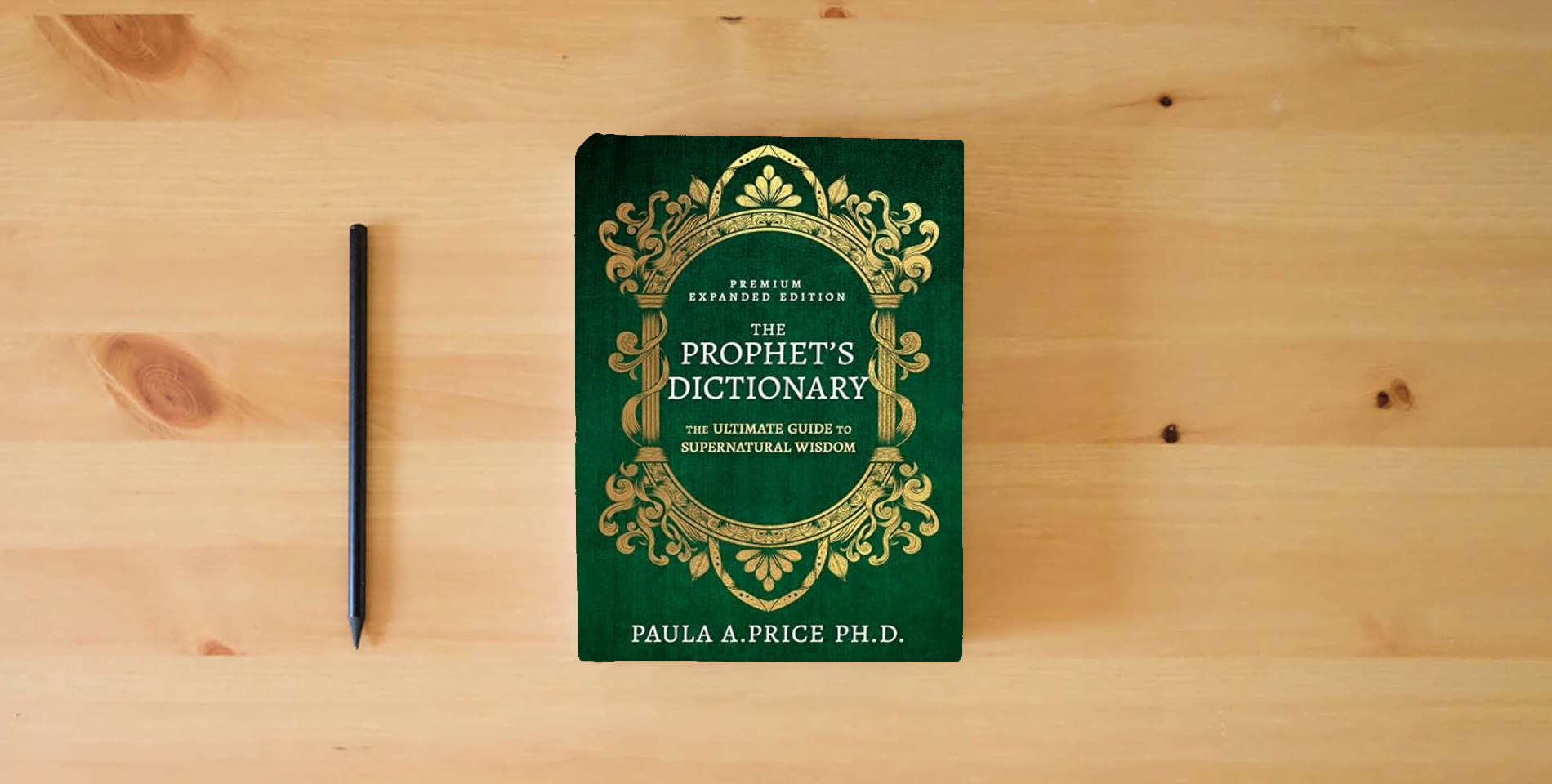 The book The Prophet's Dictionary: The Ultimate Guide to Supernatural Wisdom (Premium Expanded Edition) is on the table