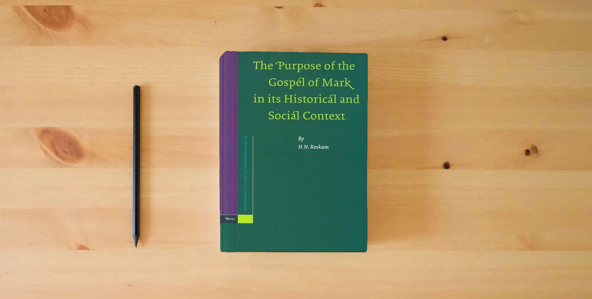 The book The Purpose of the Gospel of Mark in its Historical and Social Context (Novum Testamentum, Supplements, 114) is on the table