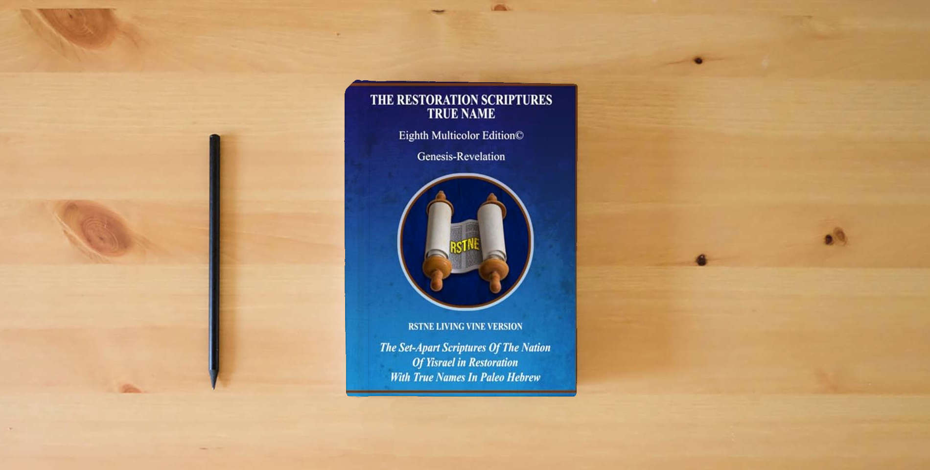 The book The Restoration Scriptutes True Name Eighth-Living Vine Version is on the table