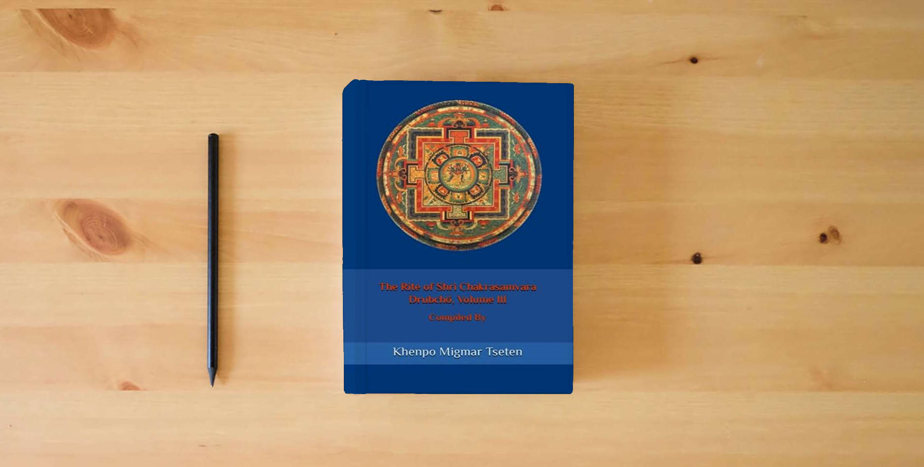 The book The Rite of Shri Chakrasamvara Drubchö, Volume III is on the table