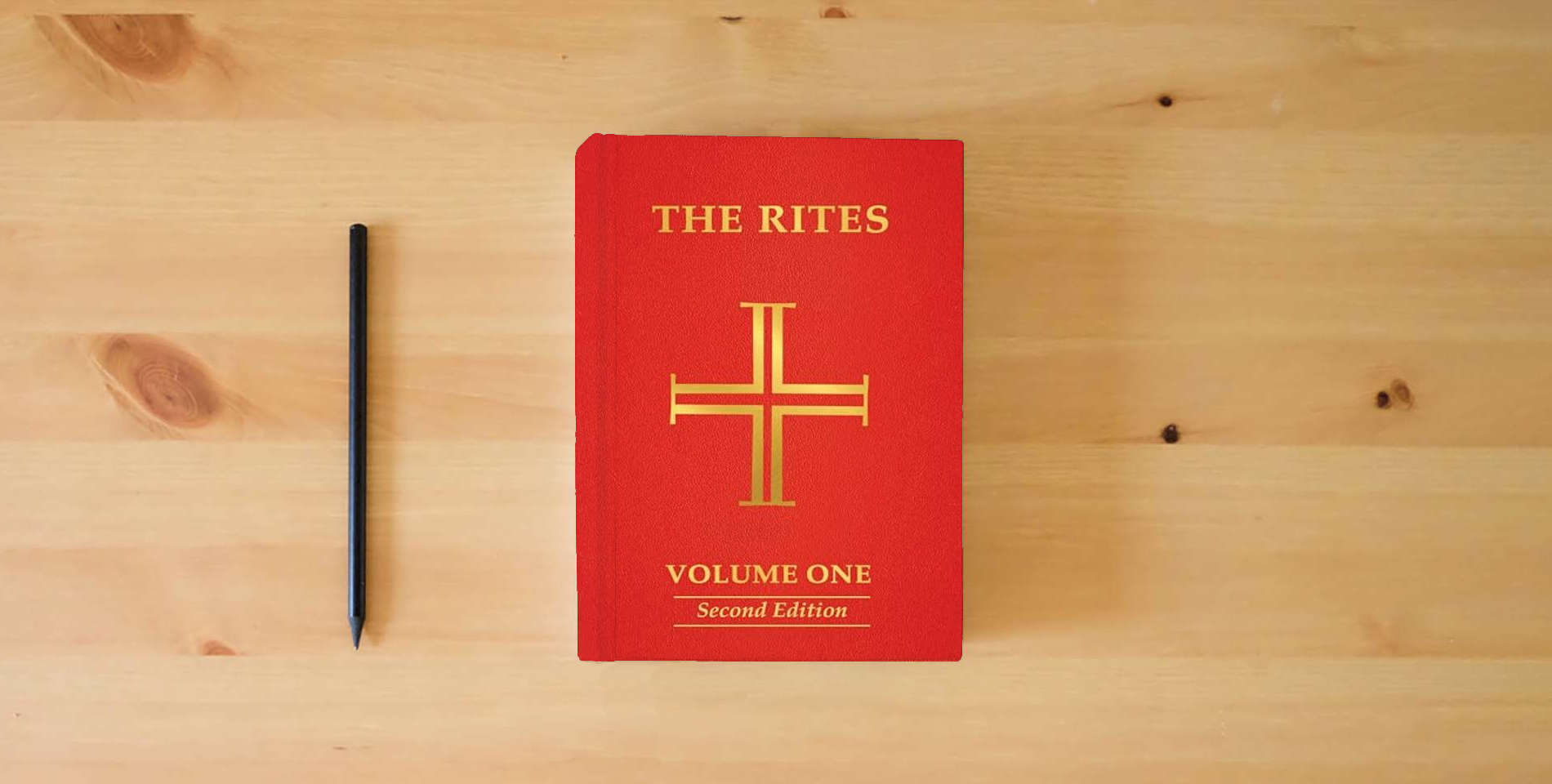 The book The Rites of the Catholic Church: Volume One, Second Edition is on the table