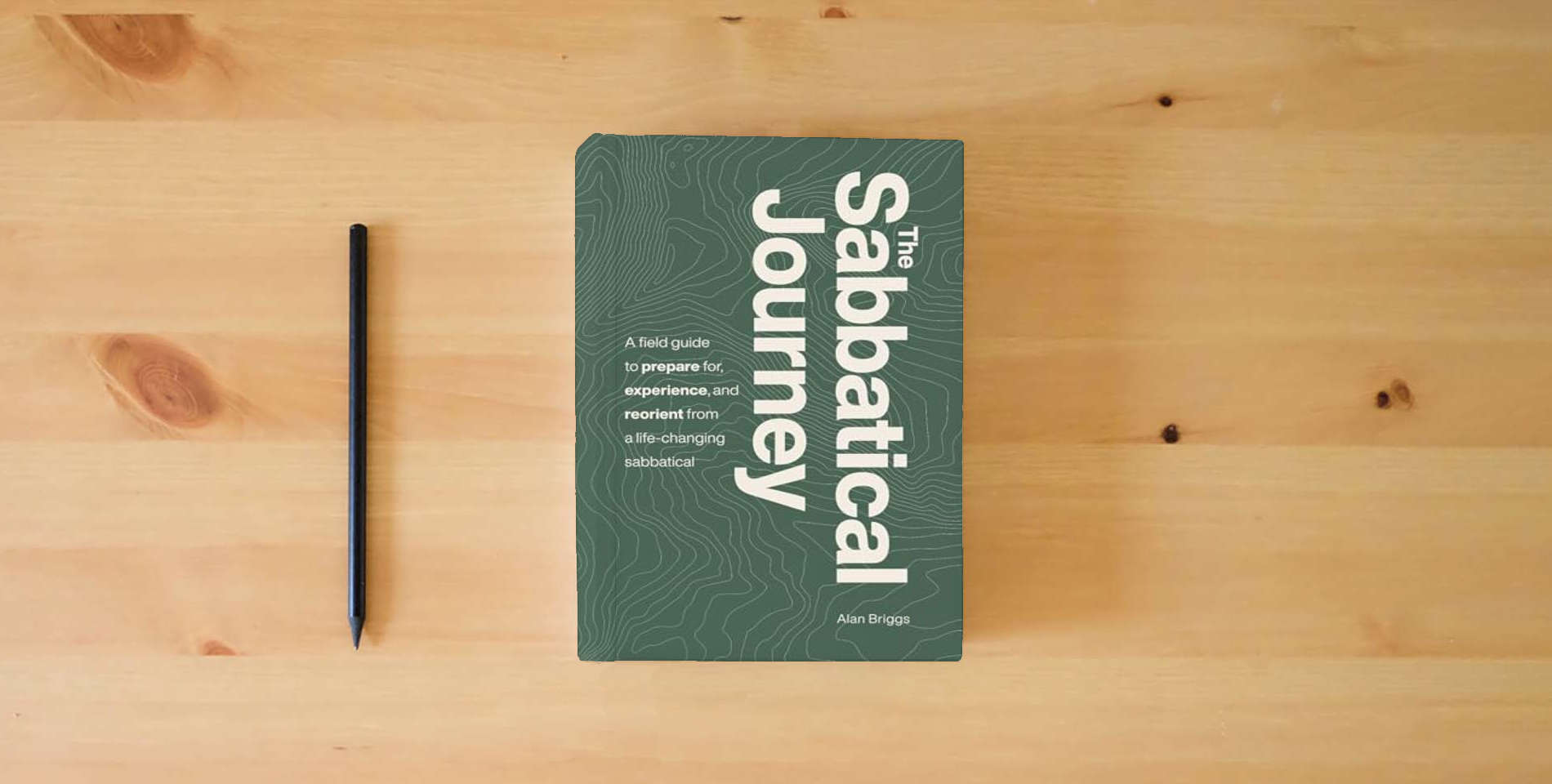 The book The Sabbatical Journey: A field guide to prepare for, experience and reorient from a life-changing sabbatical is on the table