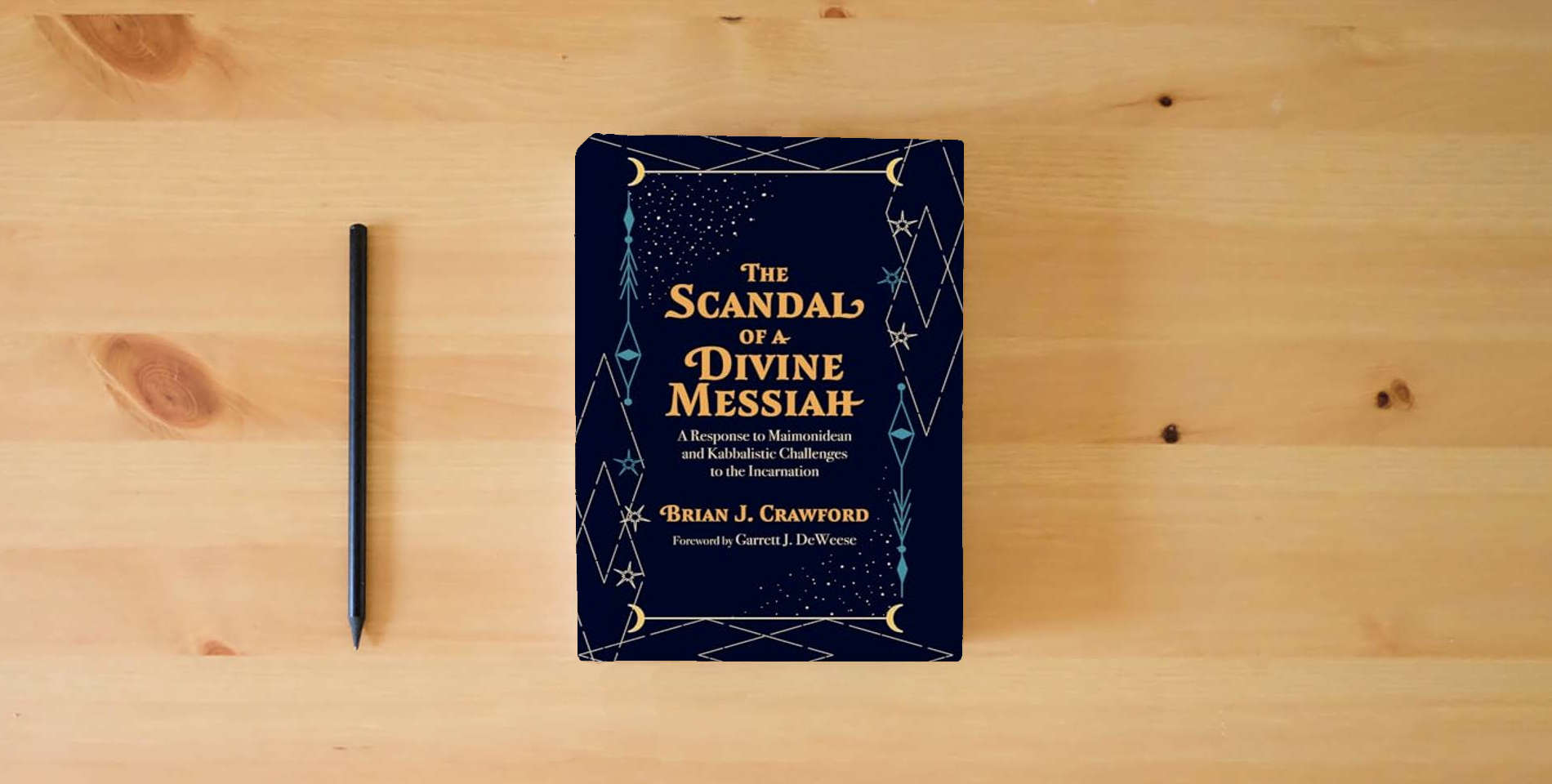 The book The Scandal of a Divine Messiah: A Response to Maimonidean and Kabbalistic Challenges to the Incarnation is on the table