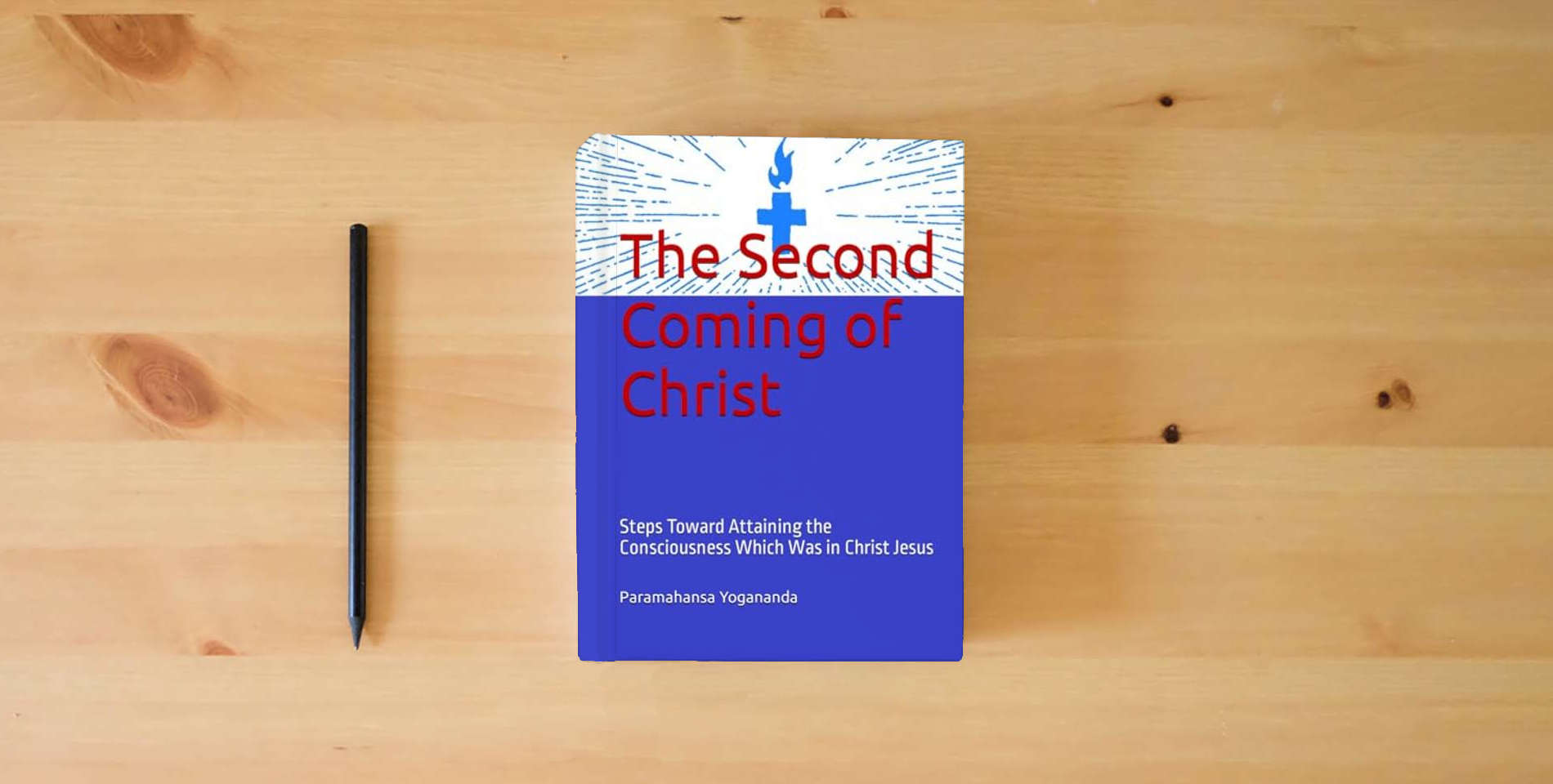 The book The Second Coming of Christ: Steps Toward Attaining the Consciousness Which Was in Christ Jesus is on the table