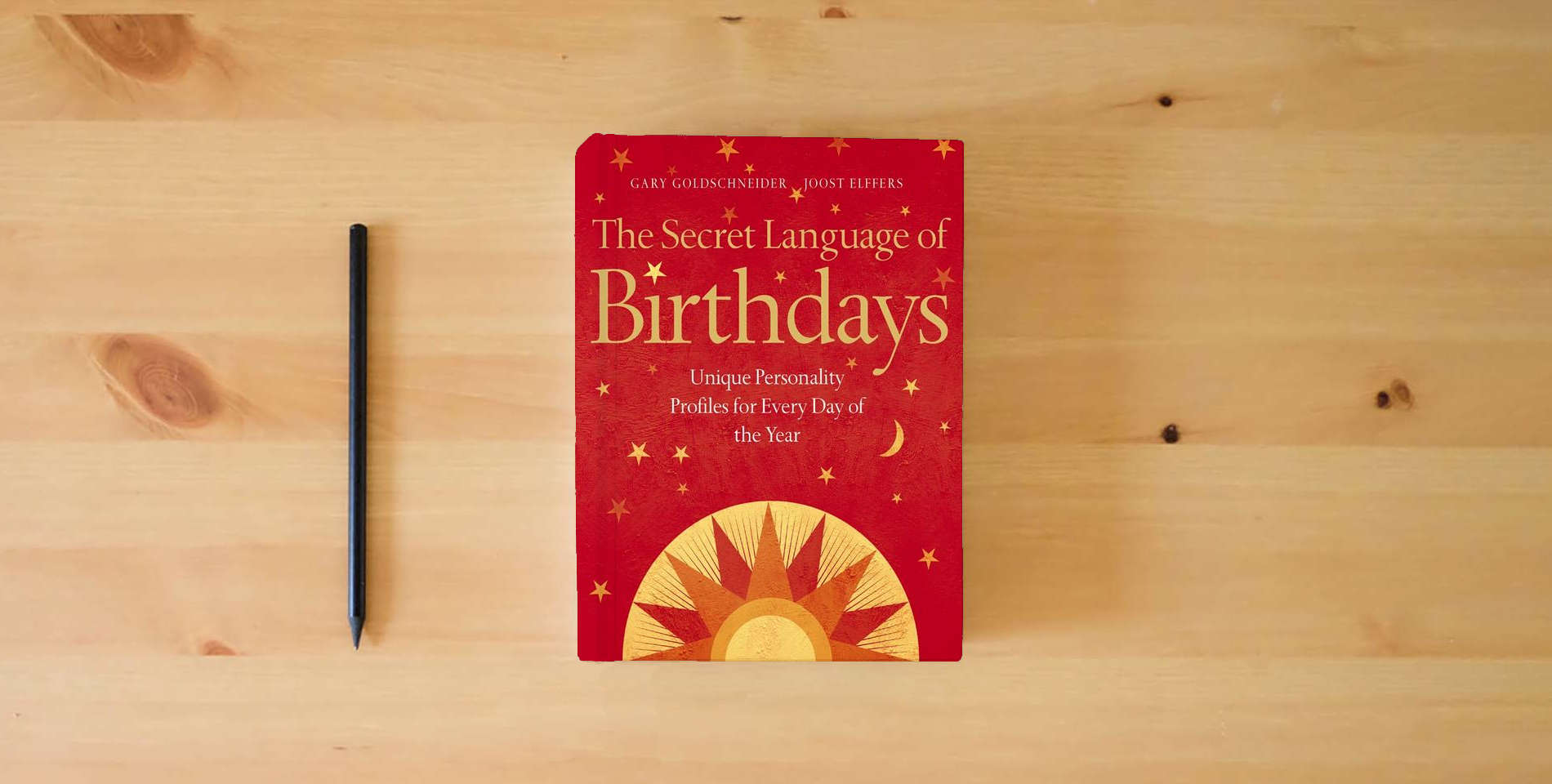 The book The Secret Language of Birthdays : Unique Personality Guides for Every Day of the Year is on the table