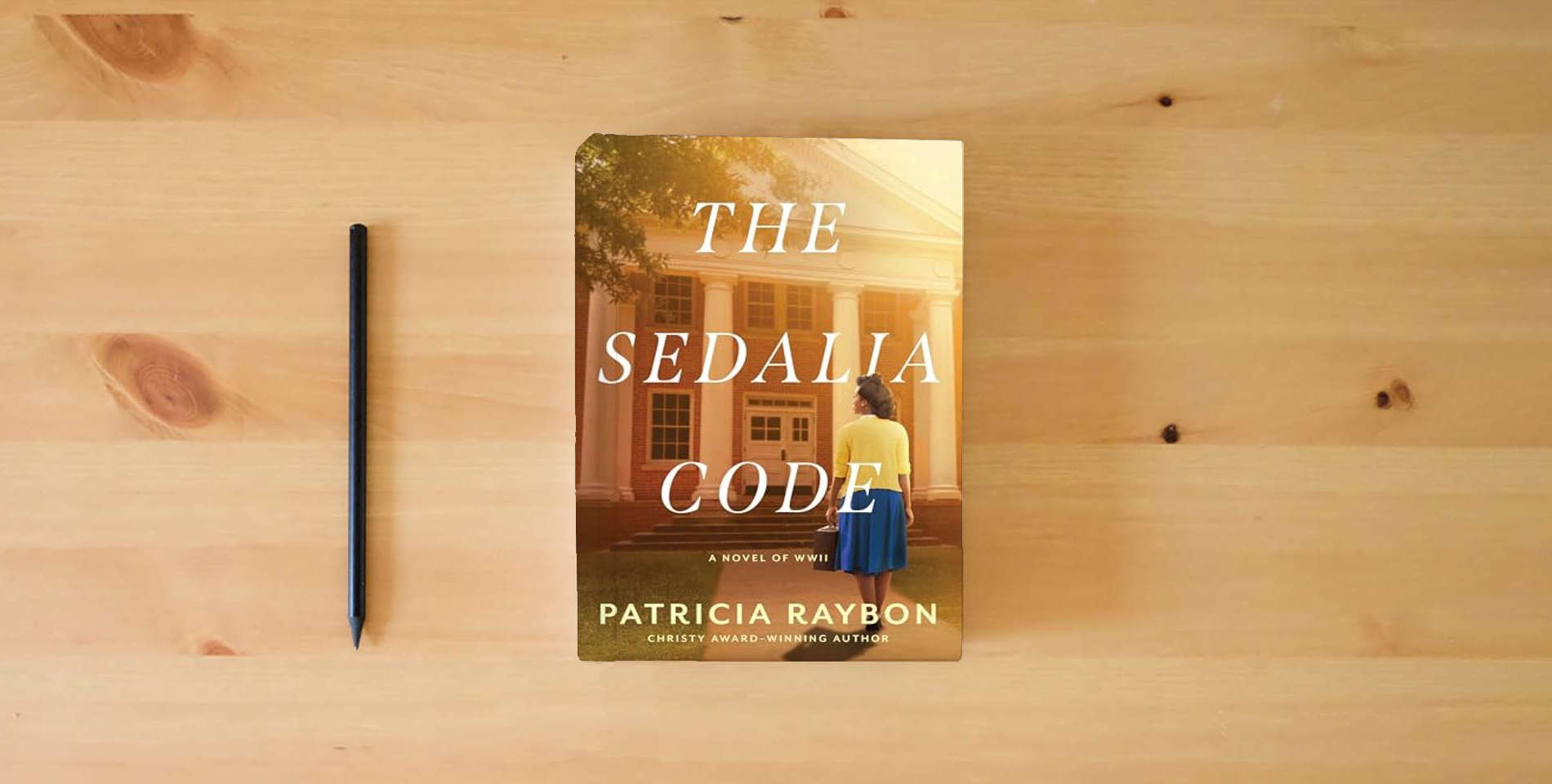 The book The Sedalia Code is on the table