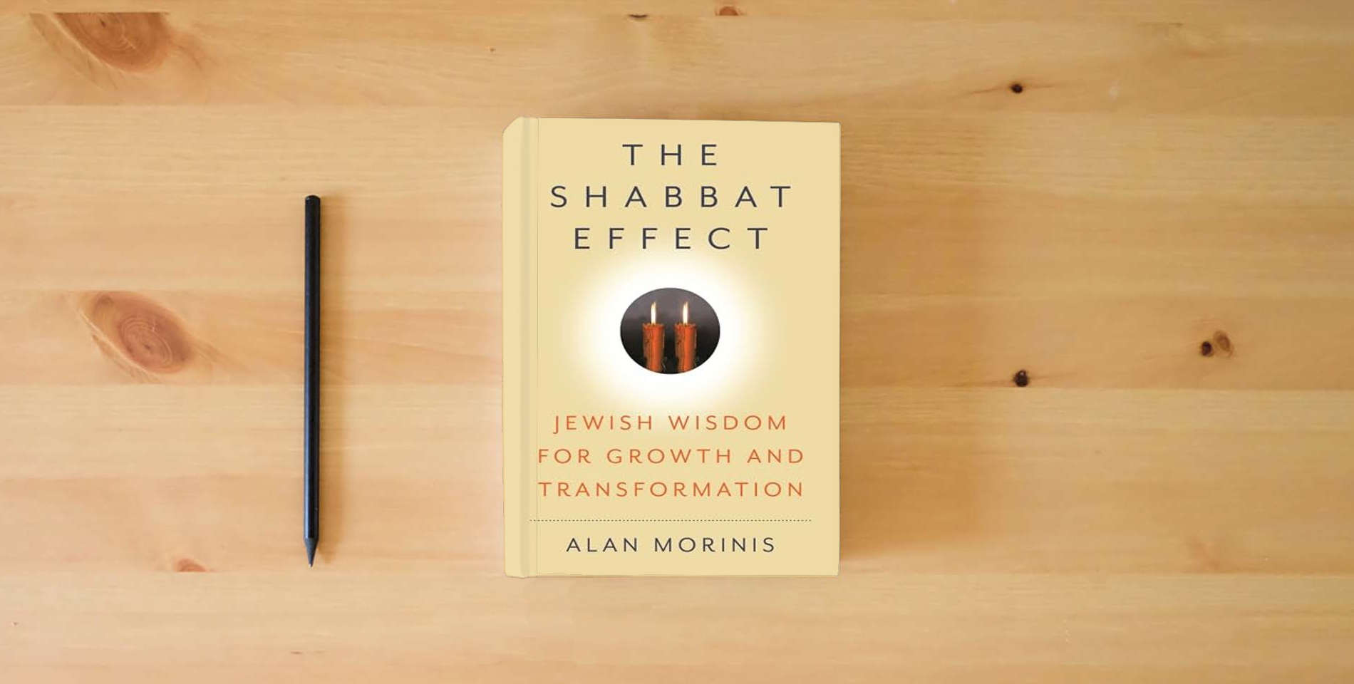 The book The Shabbat Effect: Jewish Wisdom for Growth and Transformation is on the table