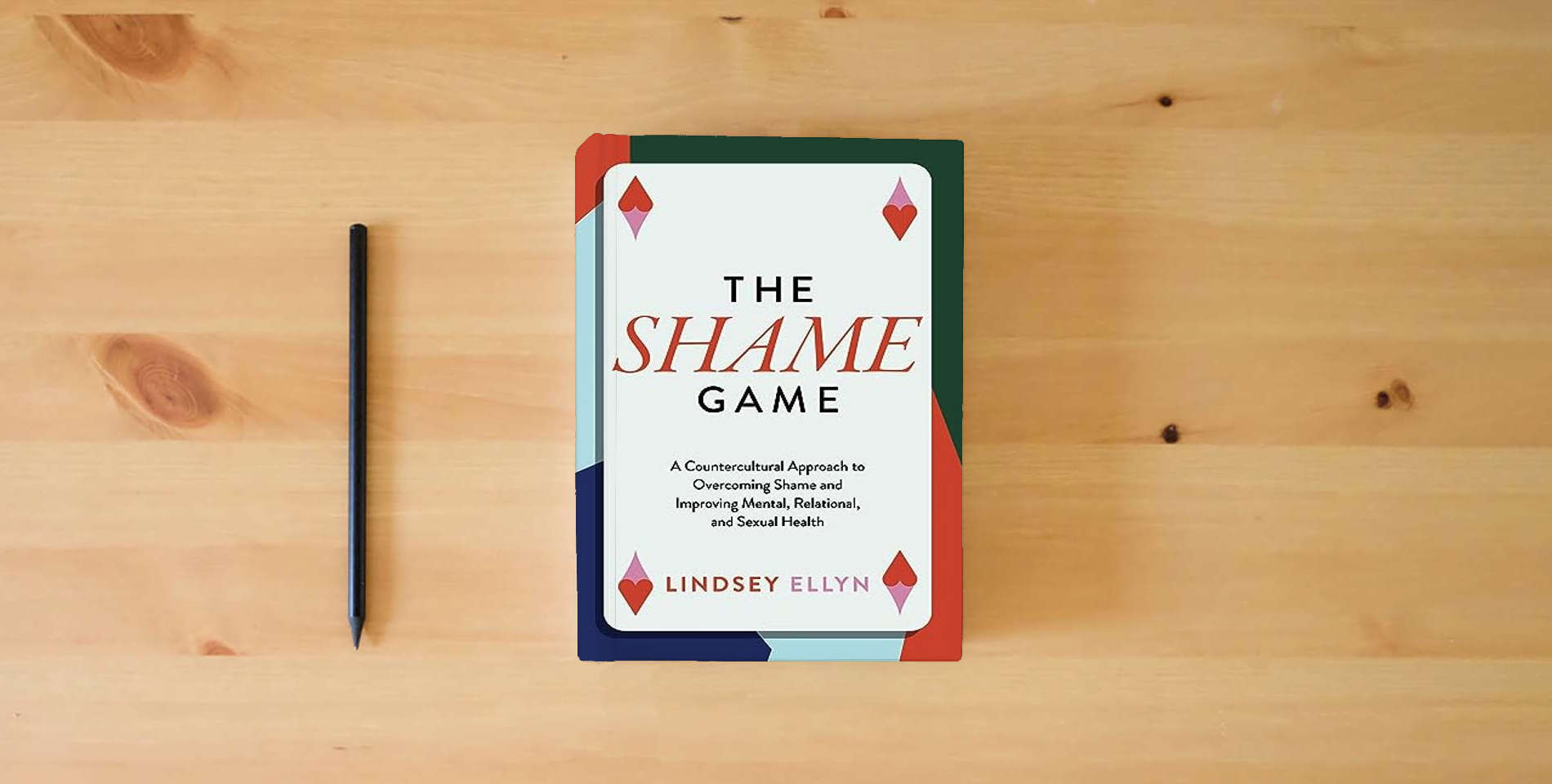The book The Shame Game: A Countercultural Approach to Overcoming Shame and Improving Mental, Relational, and Sexual Health is on the table