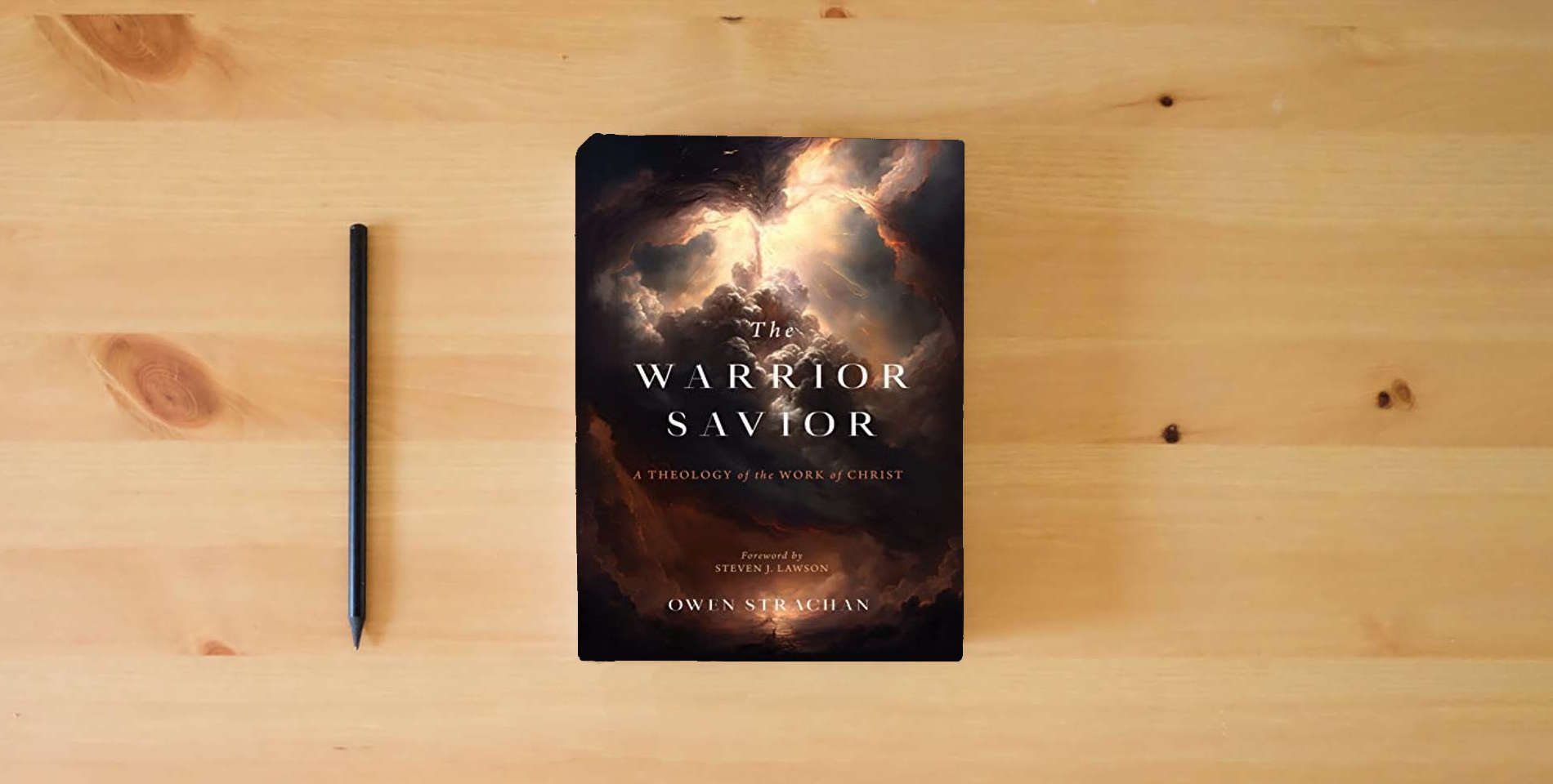 The book The Warrior Savior: A Theology of the Work of Christ is on the table