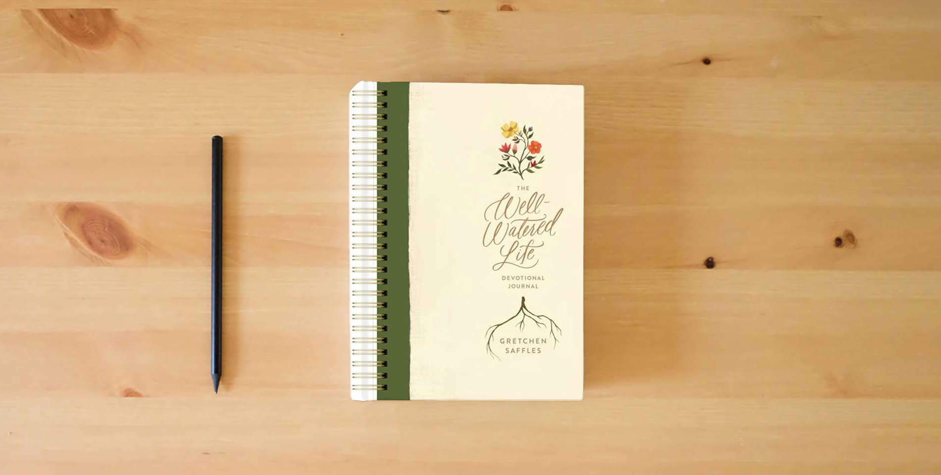 The book The Well-Watered Life is on the table