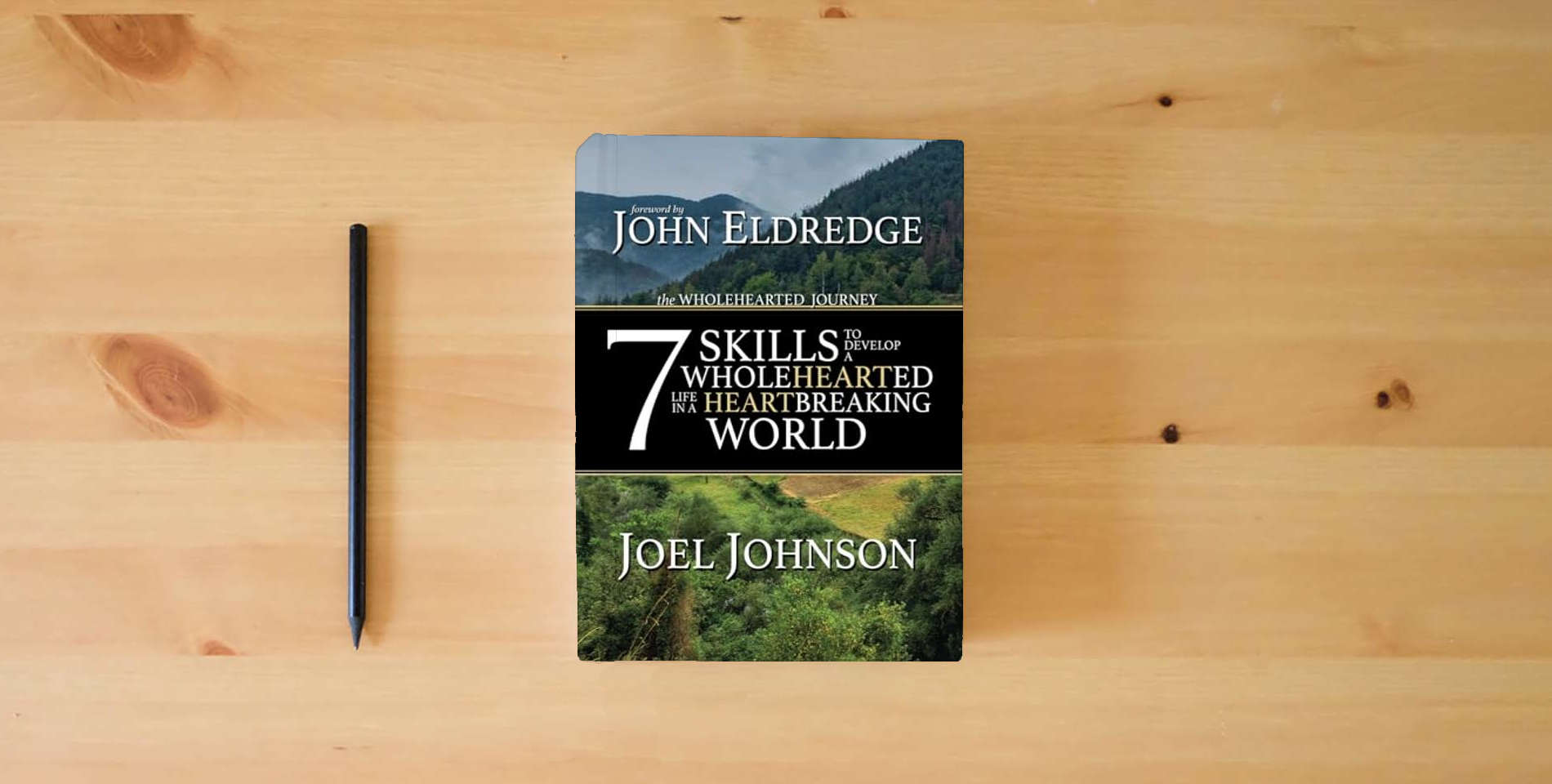 The book The Wholehearted Journey: 7 Skills to Develop a Wholehearted Life in a Heartbreaking World is on the table