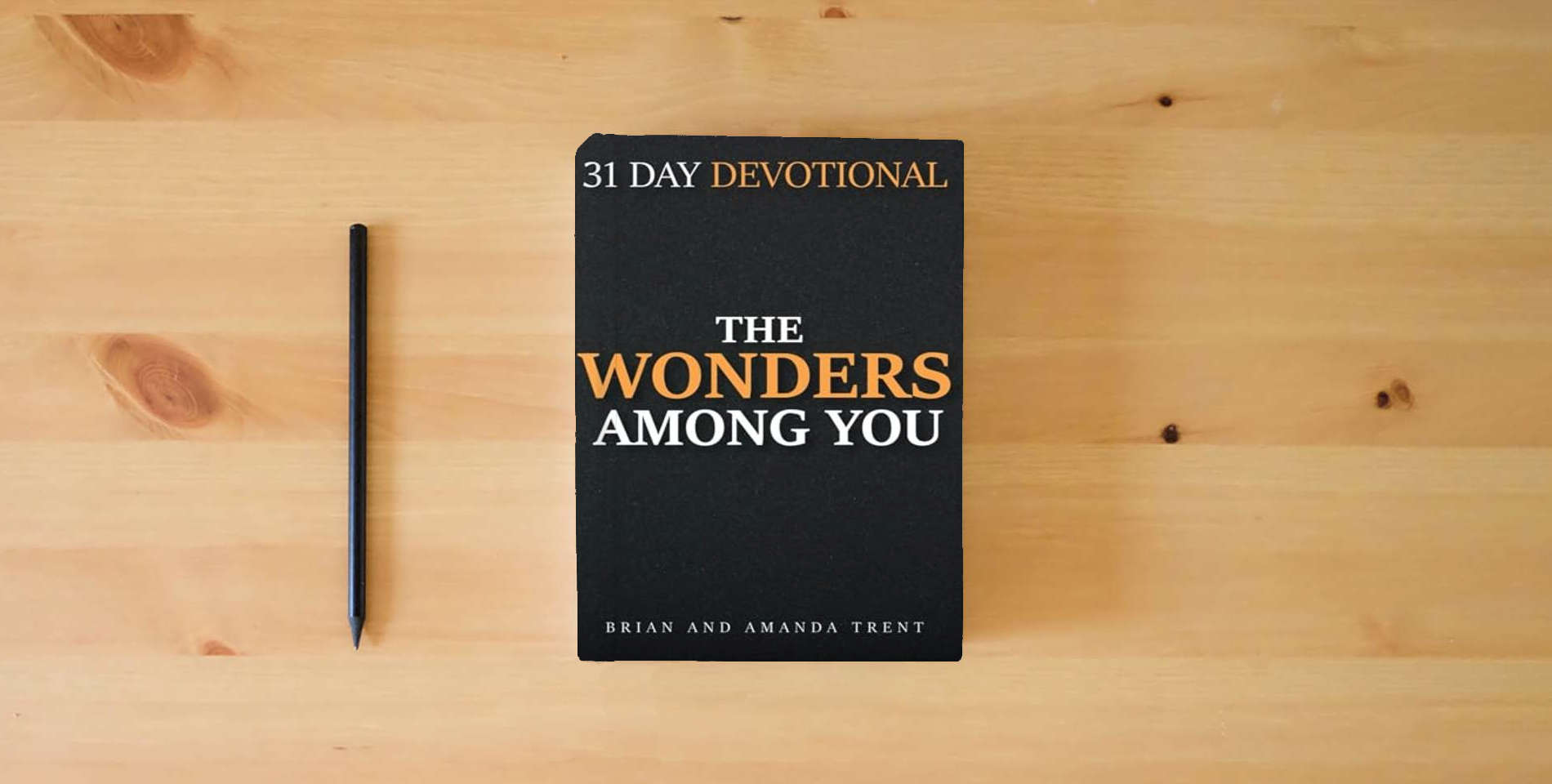 The book The Wonders Among You: 31 Day Devotional is on the table