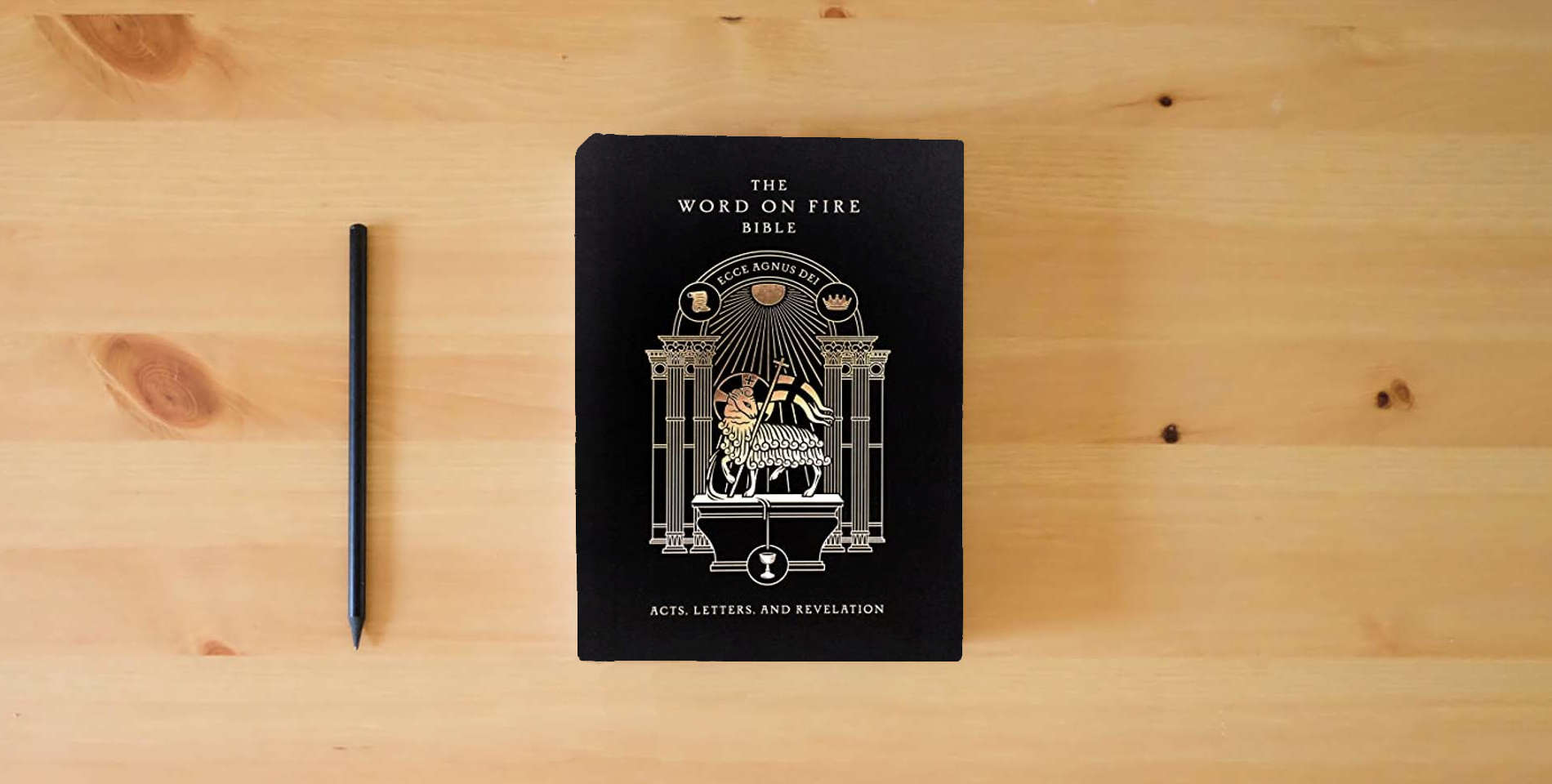 The book The Word on Fire Bible (Volume II): Acts, Letters and Revelation (Hardcover) (Word on Fire Bible Series) is on the table