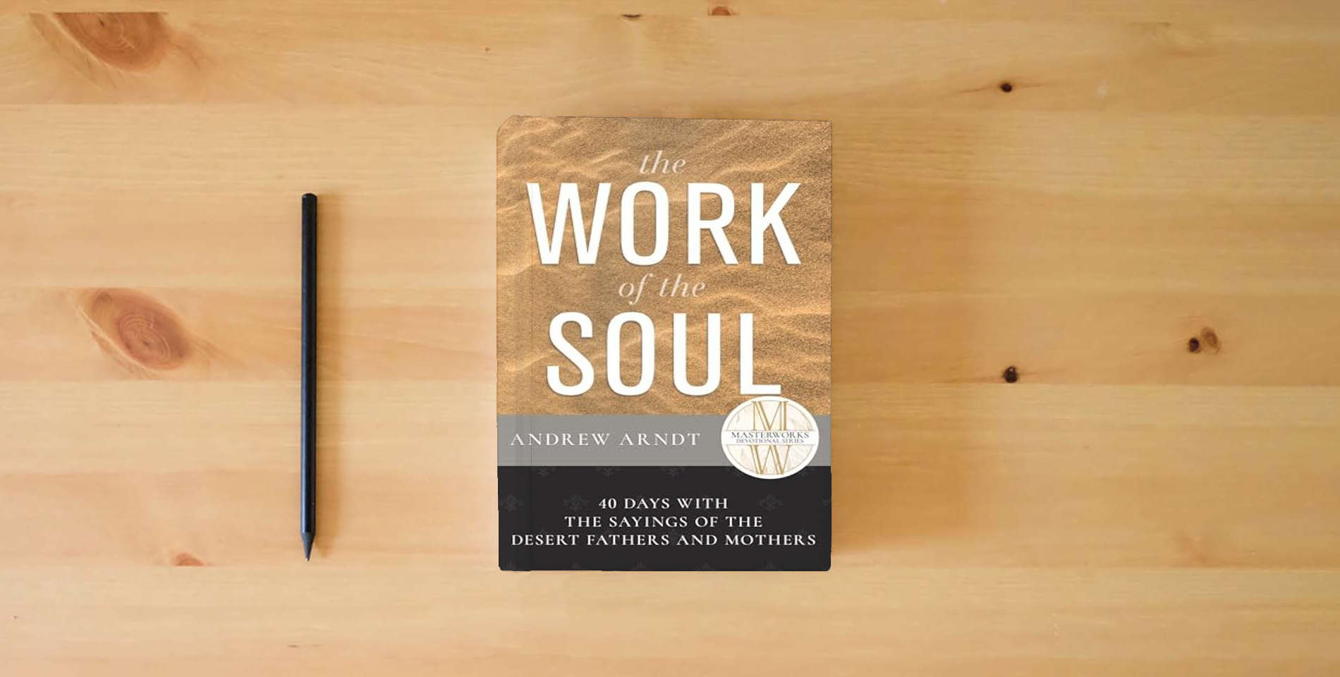 The book The Work of the Soul: 40 Days with the Sayings of the Desert Fathers and Mothers (Masterworks Devotional) is on the table