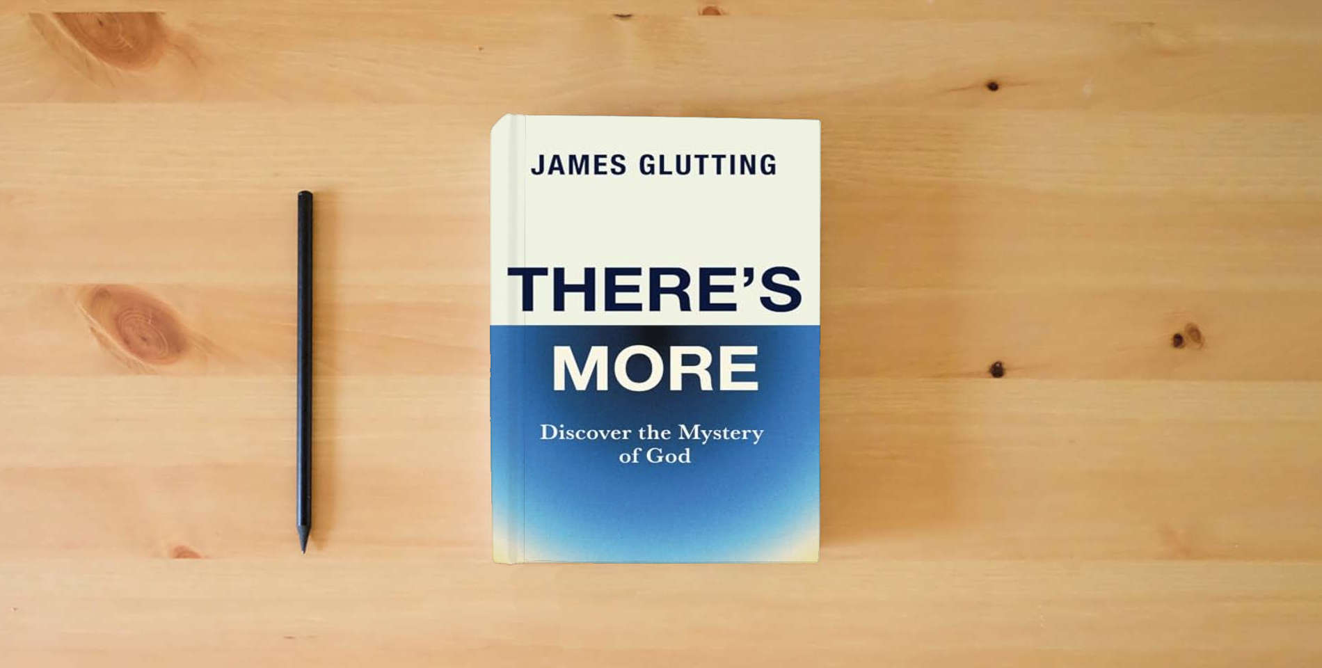 The book There's More: Discover the Mystery of God is on the table