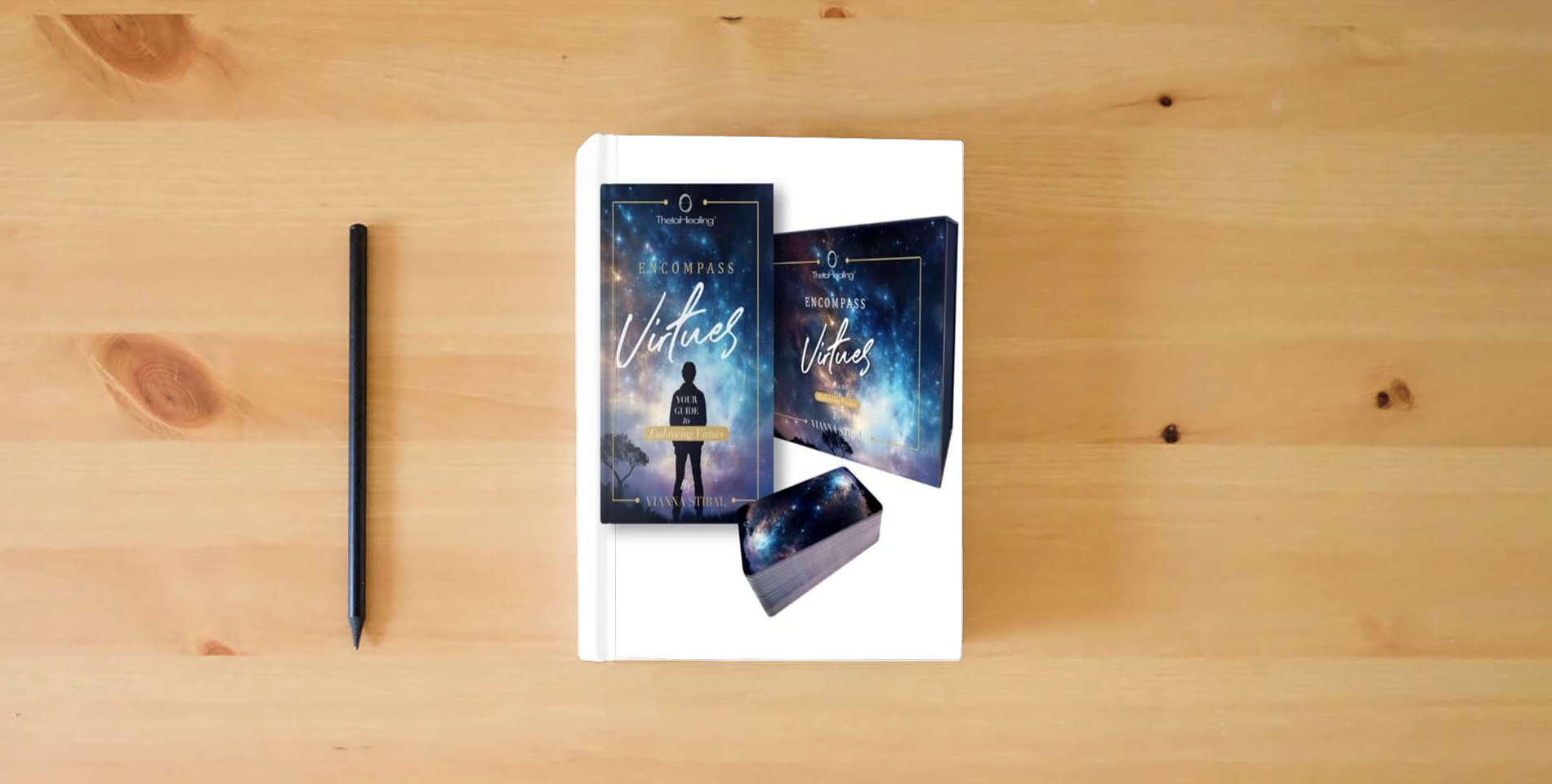 The book ThetaHealing Virture Cards Hard Cover Blue is on the table