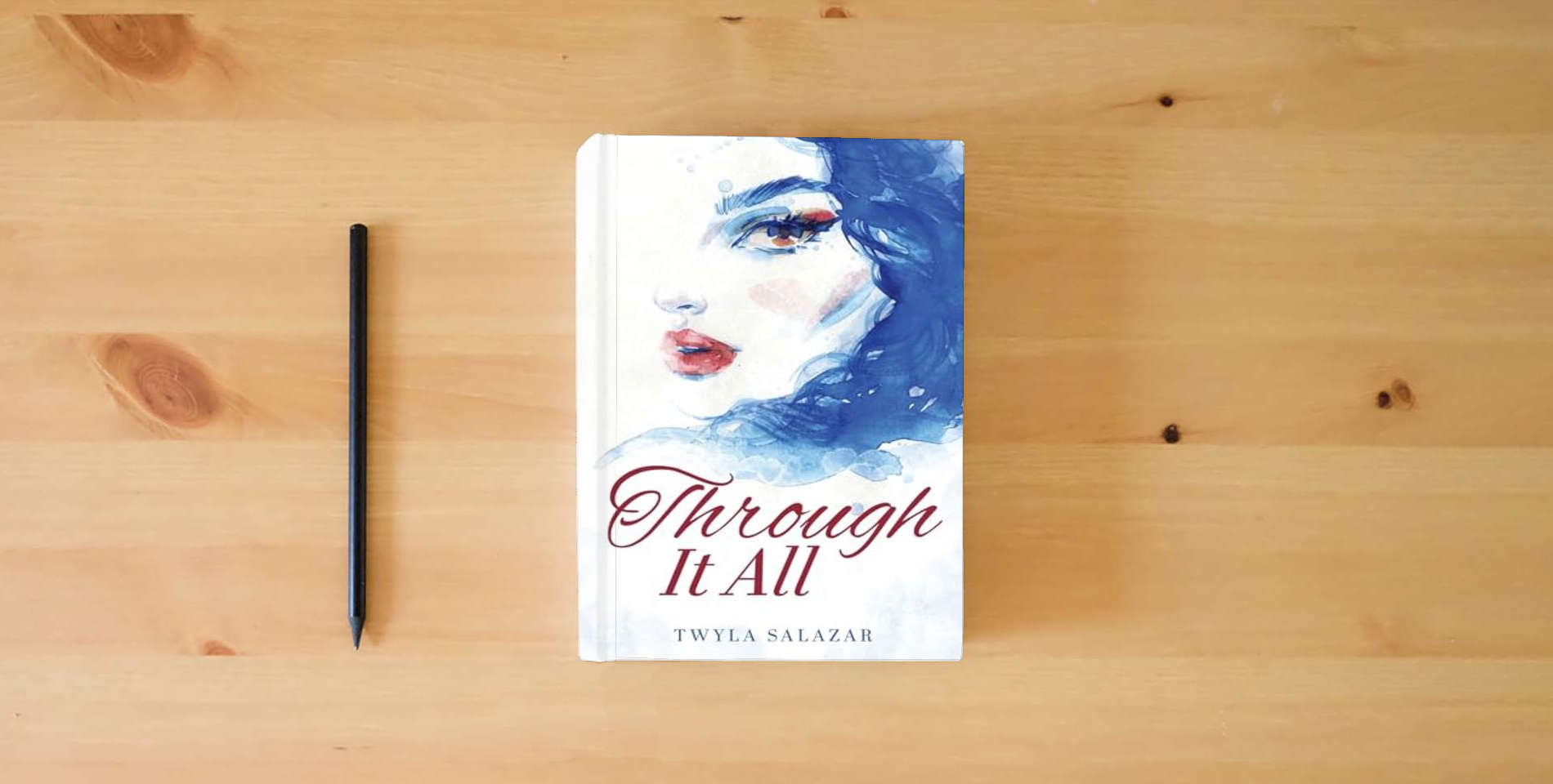 The book Through It All is on the table
