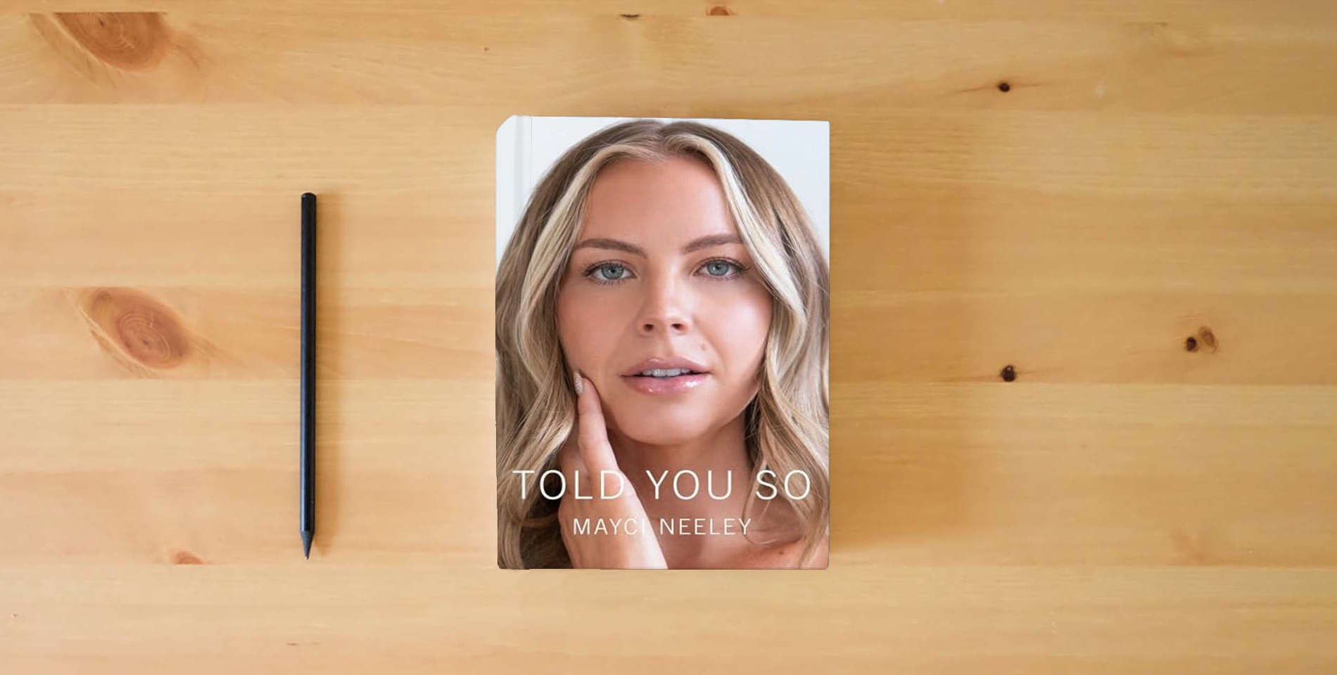 The book Told You So is on the table