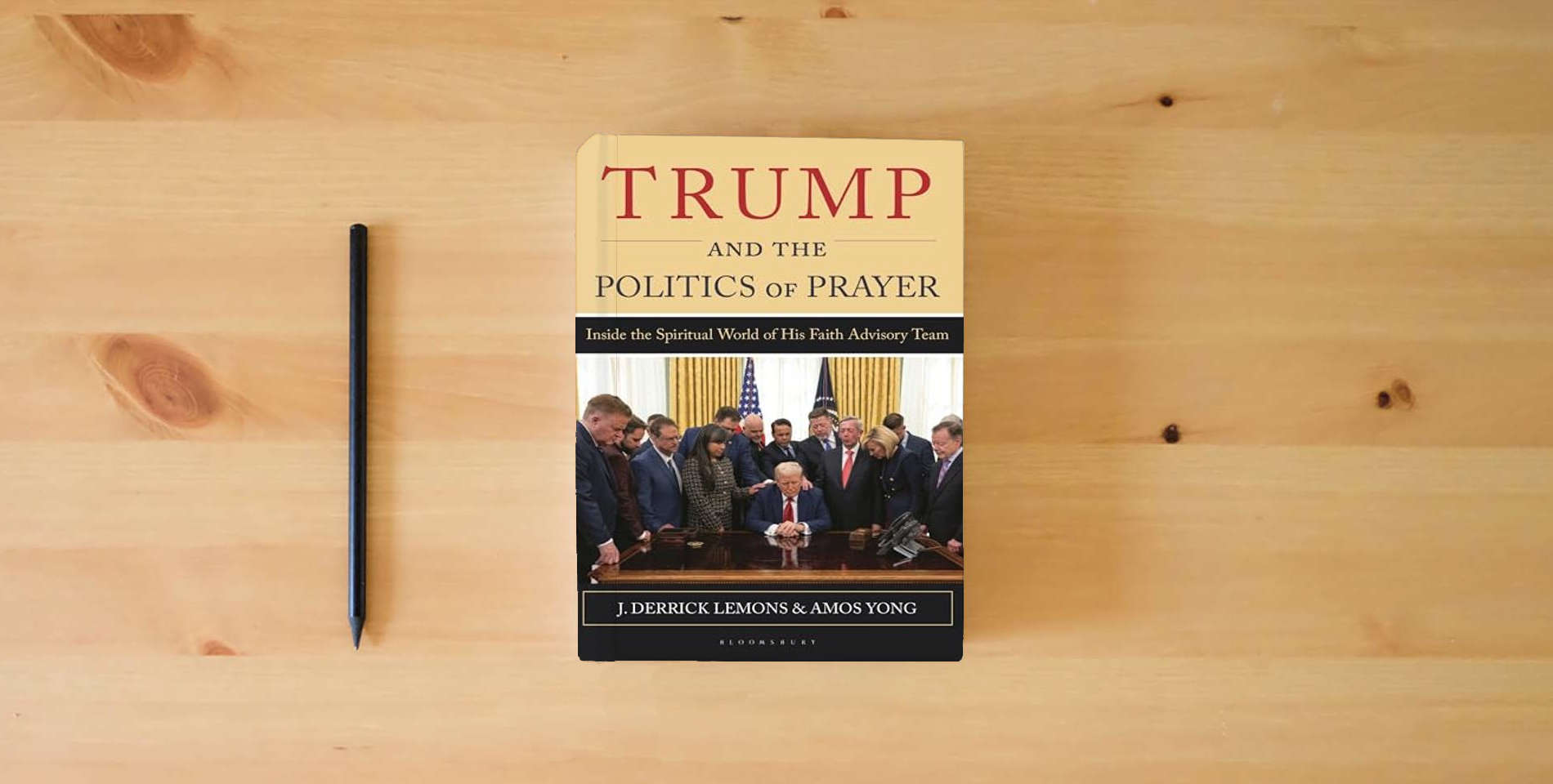 The book Trump and the Politics of Prayer: Inside the Spiritual World of His Faith Advisory Team is on the table
