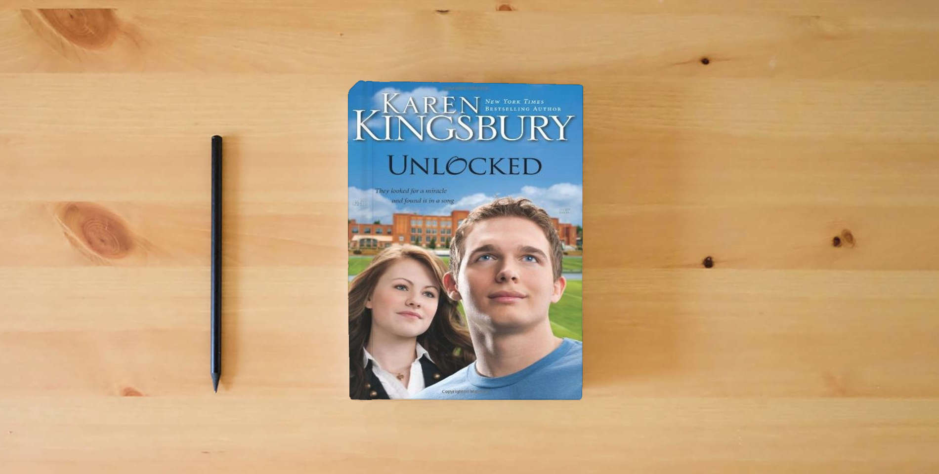 The book Unlocked: A Love Story is on the table