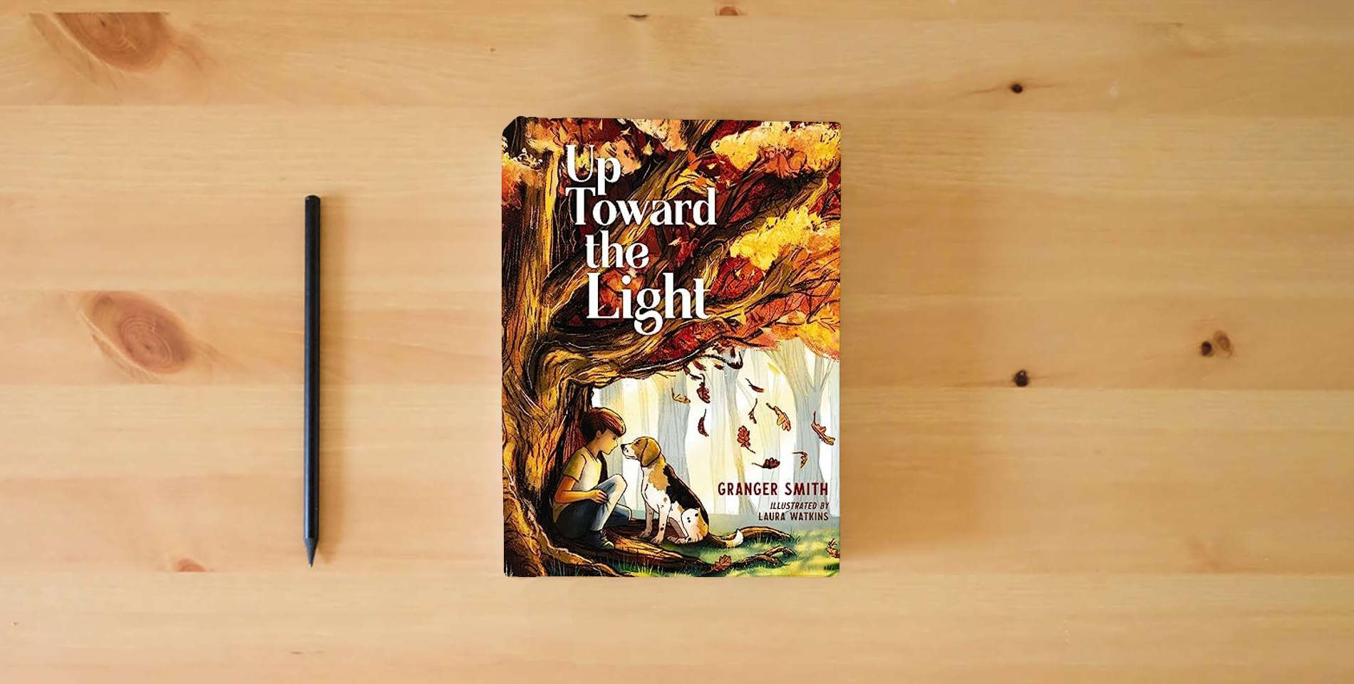 The book Up Toward the Light is on the table