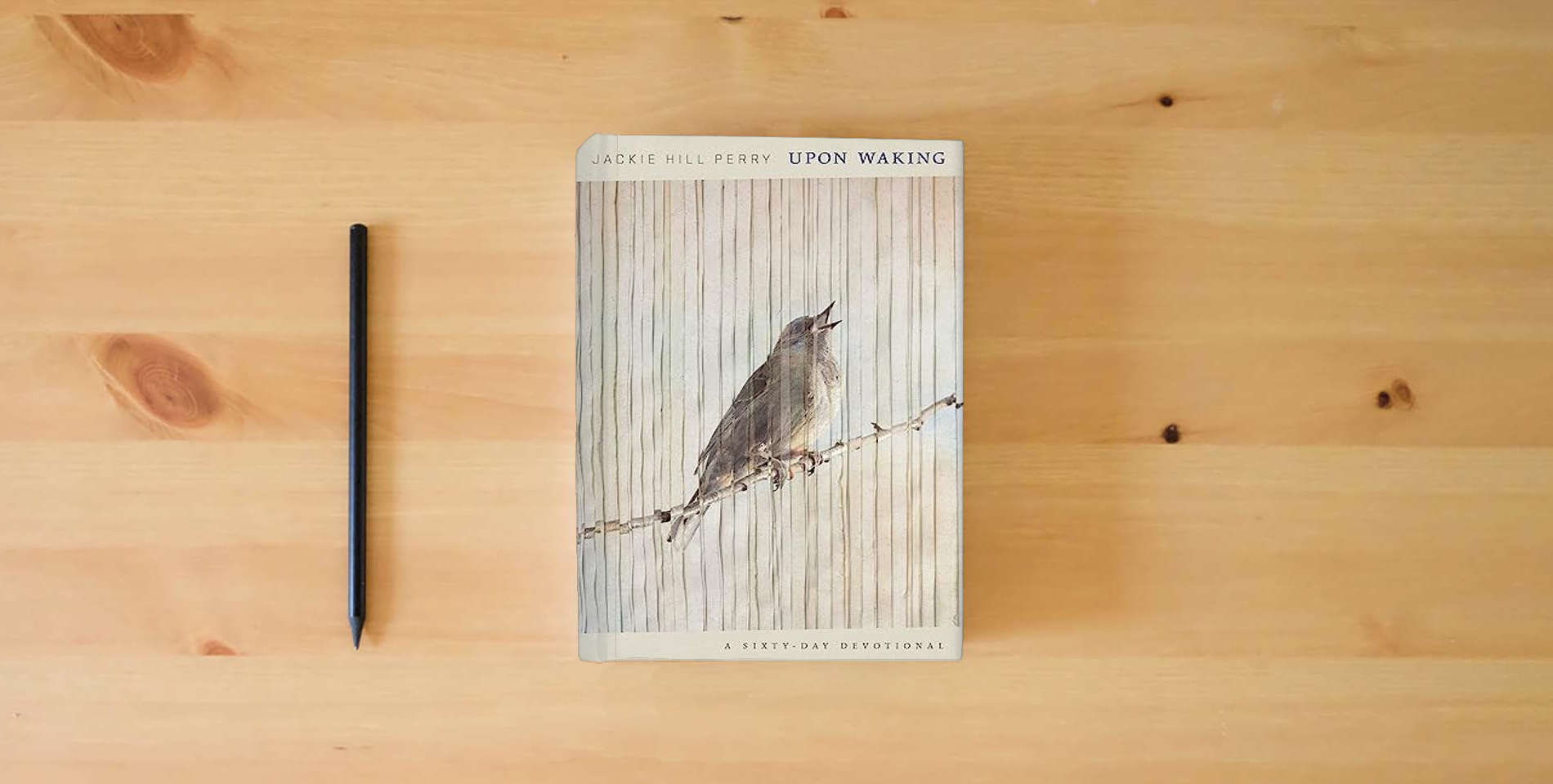 The book Upon Waking: 60 Daily Reflections to Discover Ourselves and the God We Were Made For is on the table