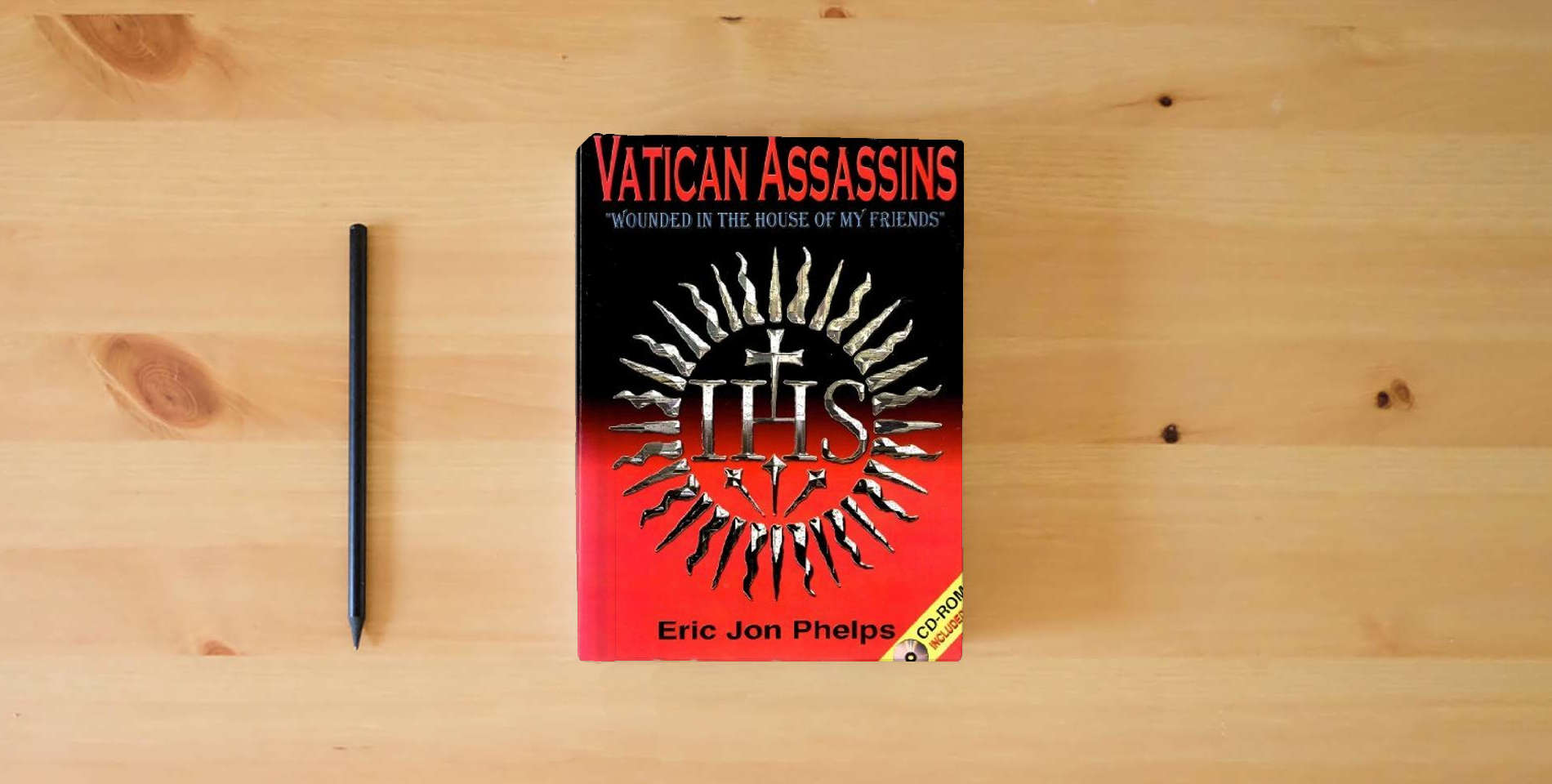 The book Vatican assassins: "wounded in the house of my friends", the diabolical history of the Society of Jesus including: its Second Thirty Years' War ... President, John Fitzgerald Kennedy (1963) is on the table