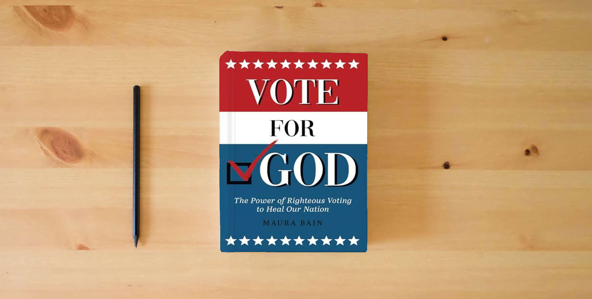 The book Vote For God: The Power of Righteous Voting to Heal Our Nation is on the table