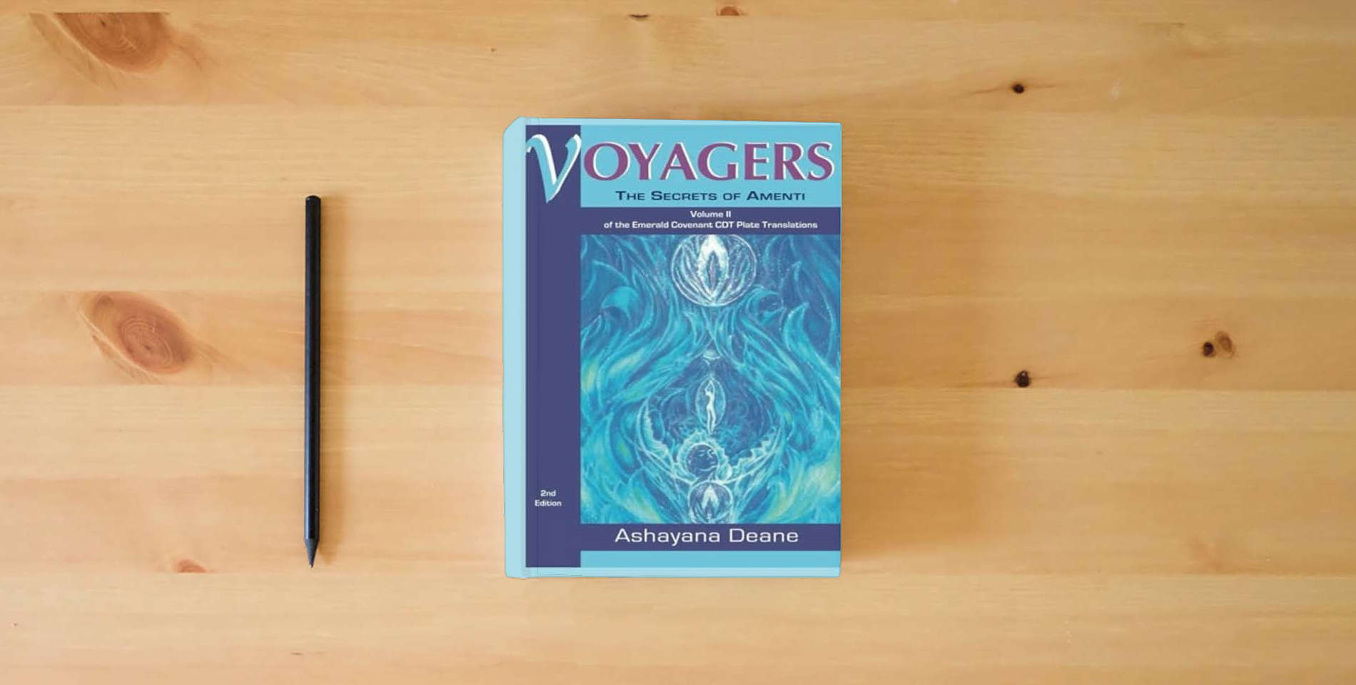 The book Voyagers II: The Secrets of Amenti is on the table