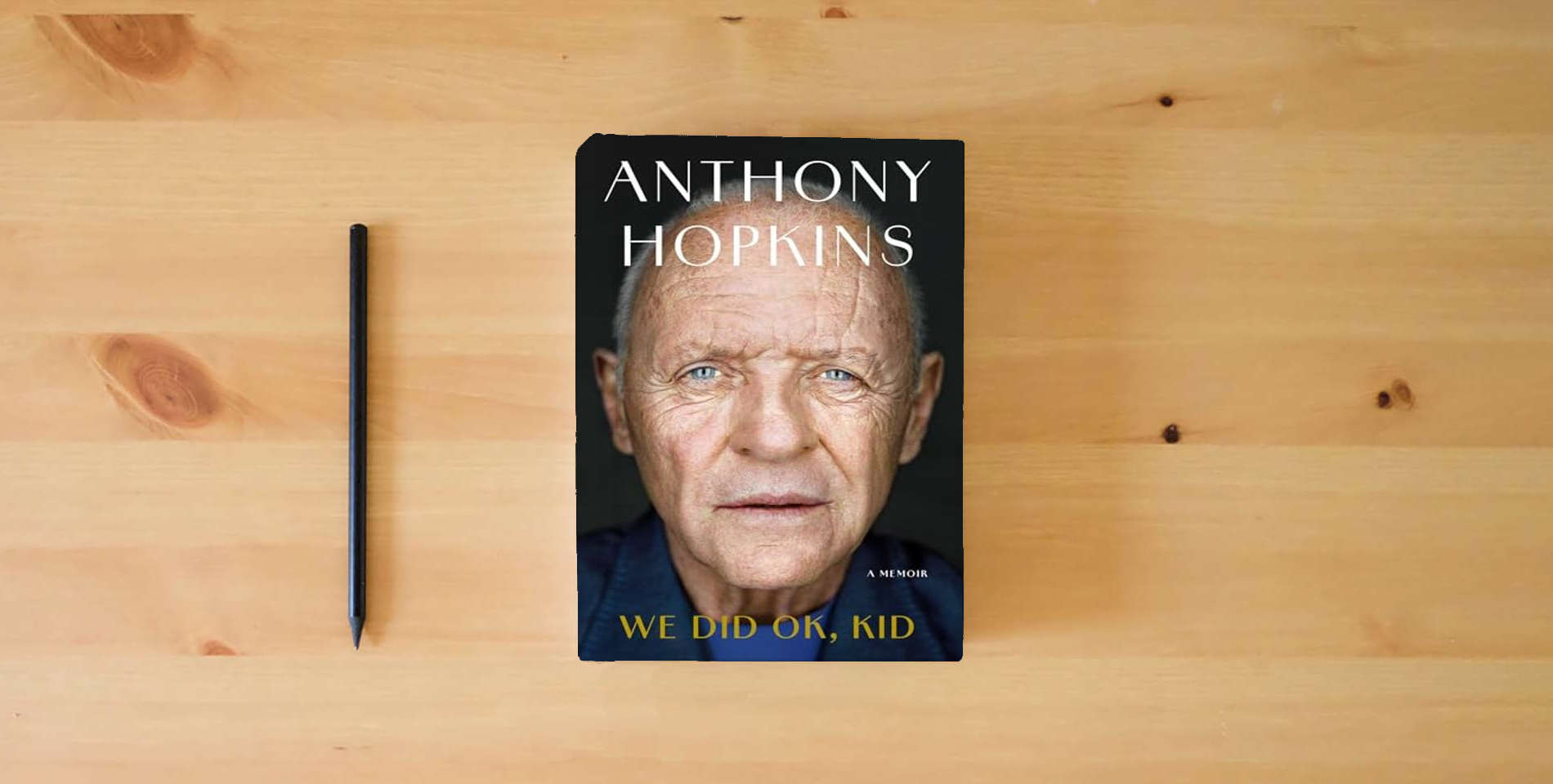 The book We Did OK, Kid: A Memoir is on the table