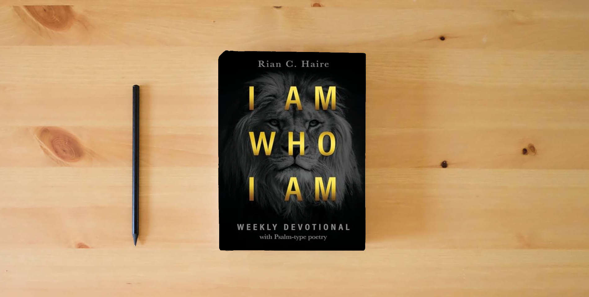The book I Am Who I Am: Weekly Devotional With Psalm-type Poetry is on the table