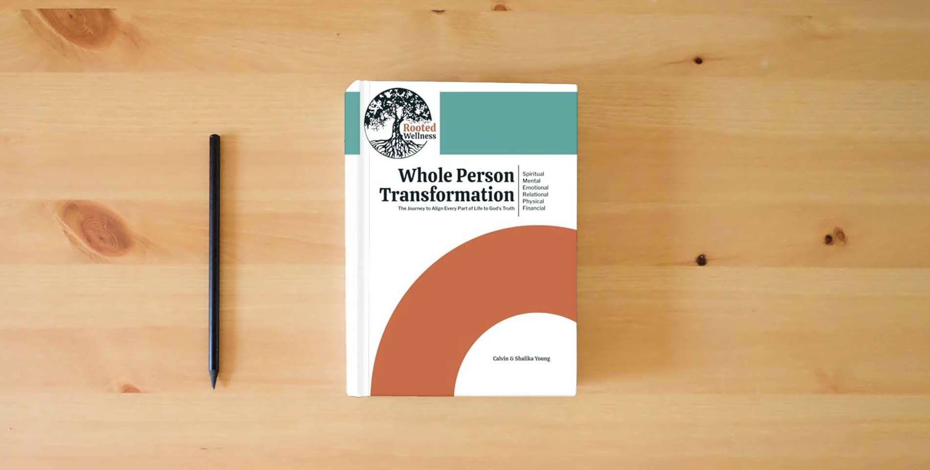 The book Whole Person Transformation: The Journey to Align Every Part of Life to God's Truth: Spiritual, Mental, Emotional, Relational, Physical, and Financial Transformation is on the table