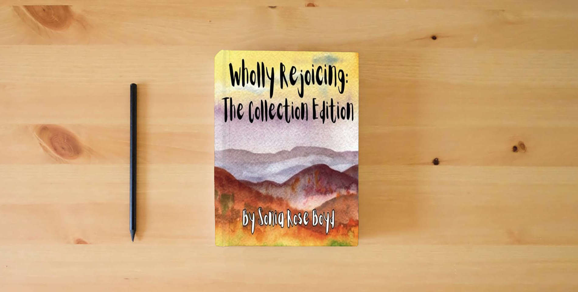 The book Wholly Rejoicing: The Collection Edition is on the table