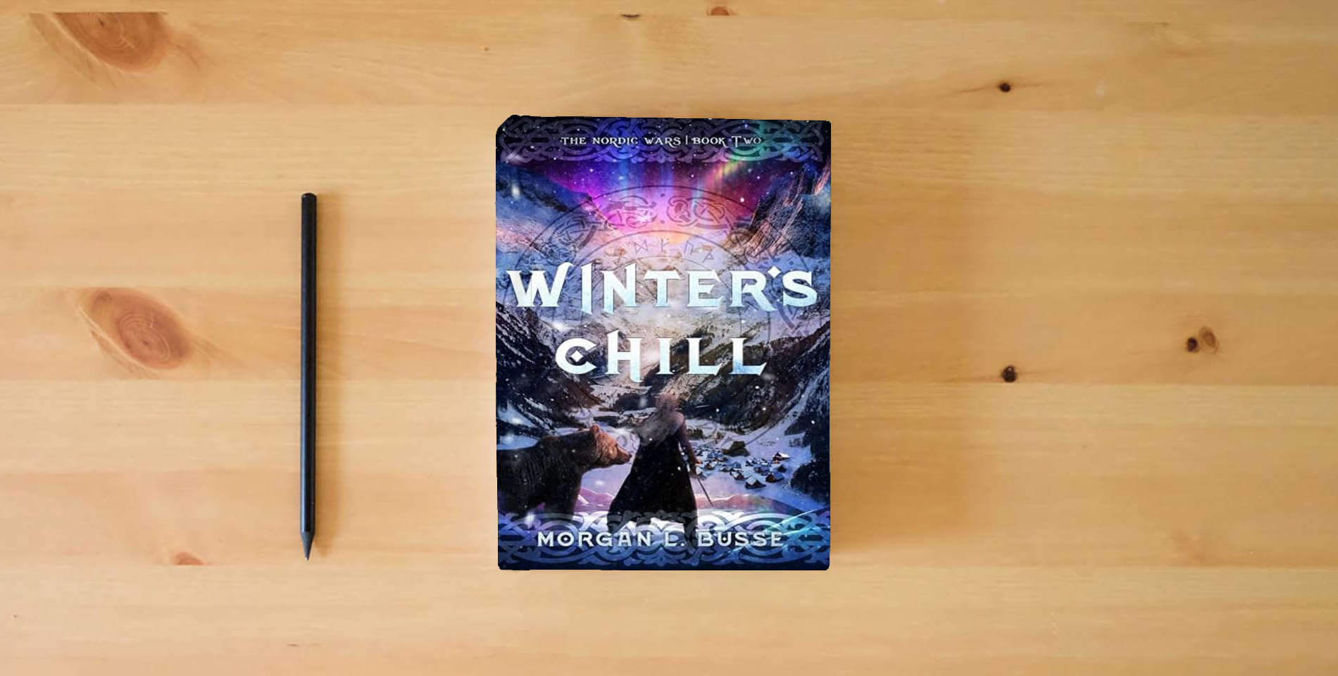 The book Winter's Chill (Volume 2) (The Nordic Wars) is on the table