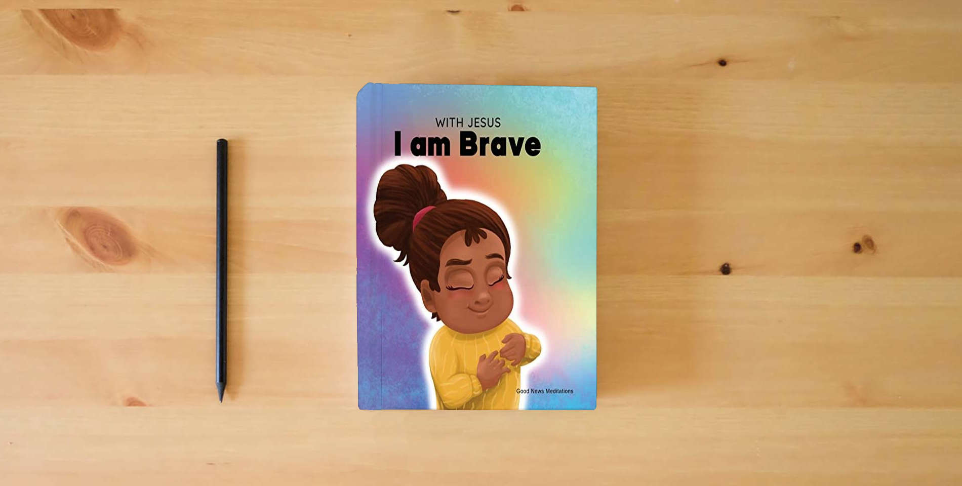 The book With Jesus I am brave: A Christian children book on trusting God to overcome worry, anxiety and fear of the dark is on the table