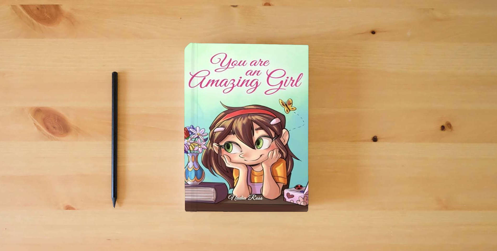 The book You are an Amazing Girl: A Collection of Inspiring Stories about Courage, Friendship, Inner Strength and Self-Confidence (Motivational Books for Children) is on the table