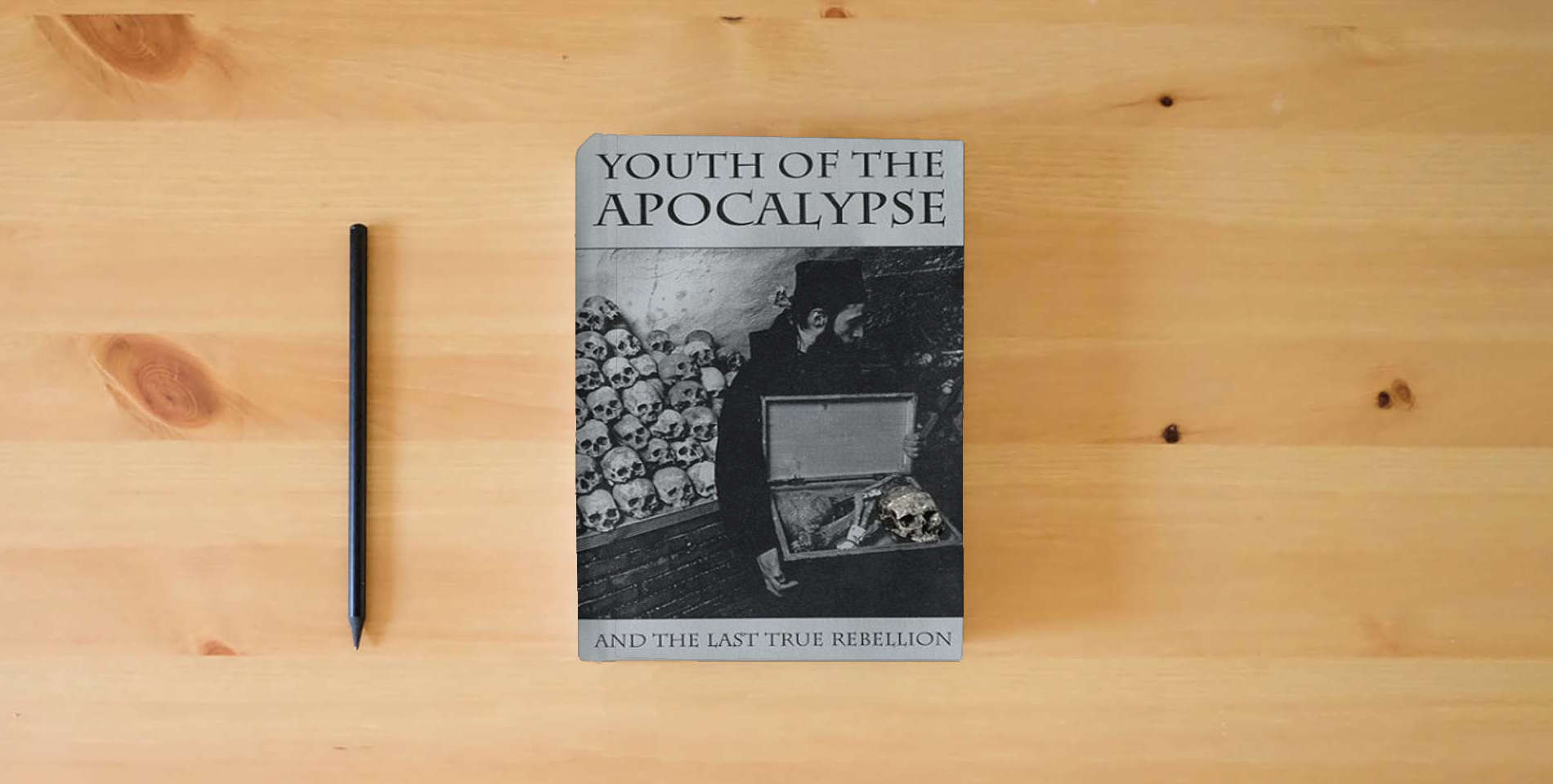 The book Youth of the Apocalypse: And the Last True Rebellion is on the table