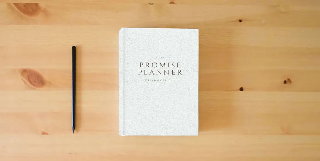 The book 2024 Promise Planner: A Weekly & Monthly Organizer with Christian Devotionals} is on the table