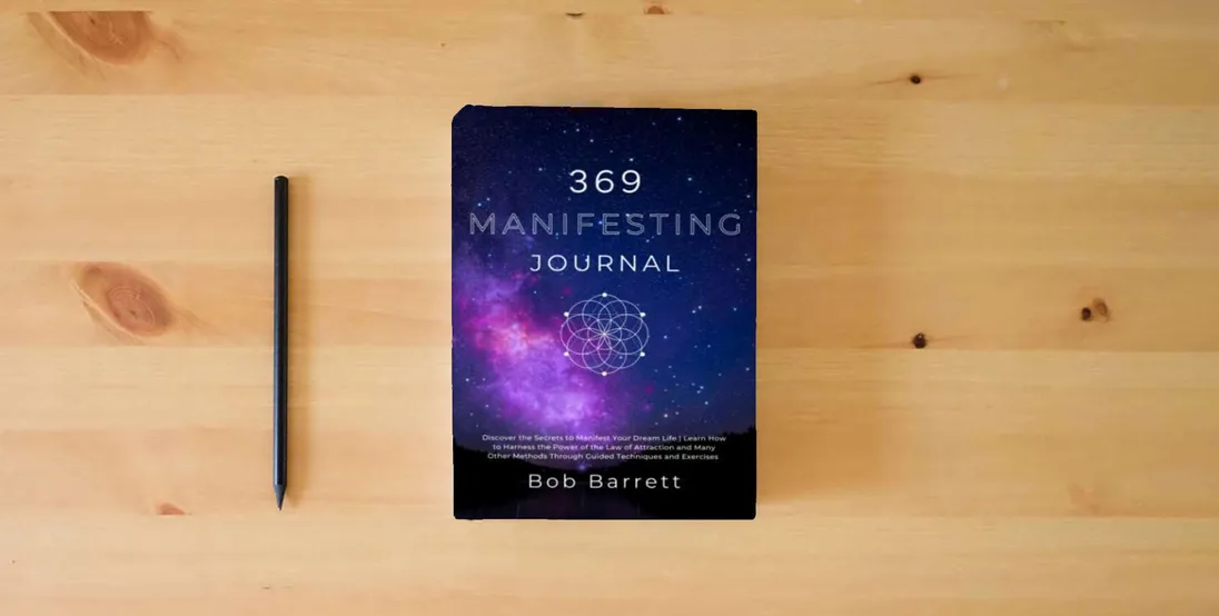 The book 369 Manifesting Journal: Discover the Secrets to Manifest Your Dream Life | Learn How to Harness the Power of the Law of Attraction and Many Other Methods Through Guided Techniques and Exercises} is on the table