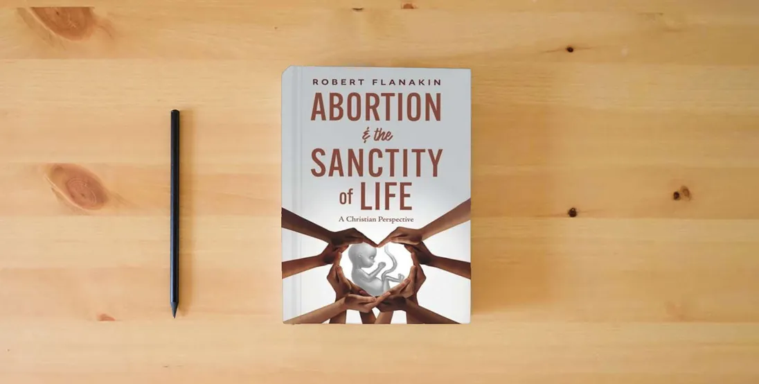 The book Abortion & the Sanctity of Life: A Christian Perspective} is on the table