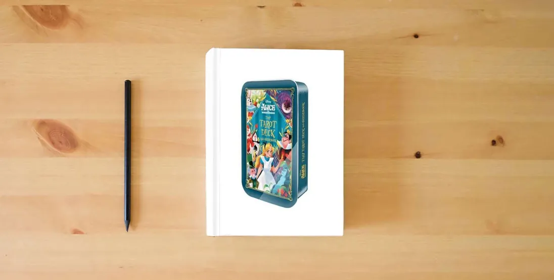 The book Alice in Wonderland Tiny Tarot Deck and Guidebook} is on the table