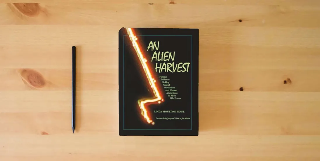 The book An Alien Harvest: Further Evidence Linking Animal Mutilations and Human Abductions to Alien Life Forms} is on the table
