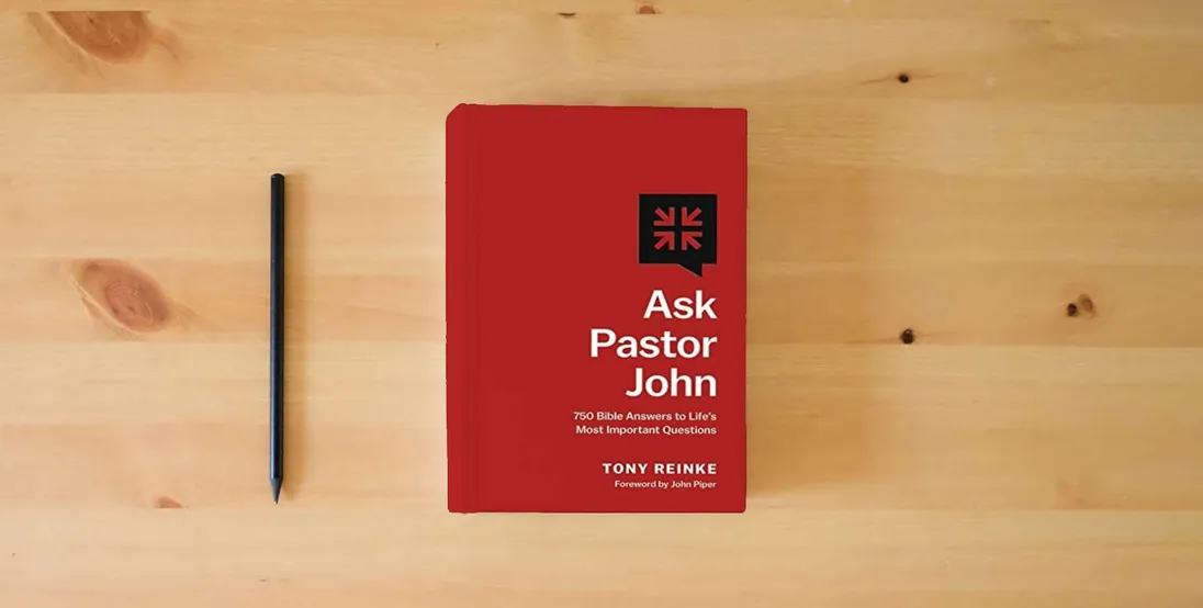 The book Ask Pastor John: 750 Bible Answers to Life's Most Important Questions} is on the table