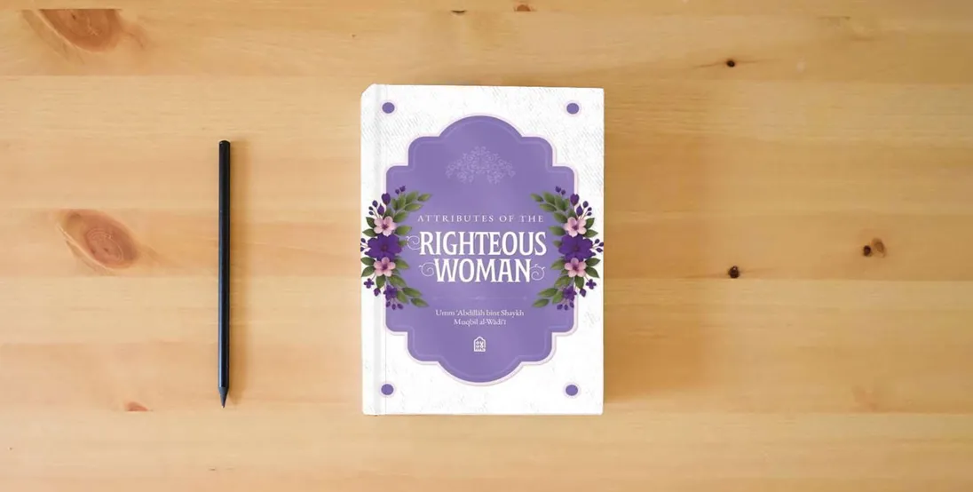 The book Attributes of the Righteous Woman} is on the table