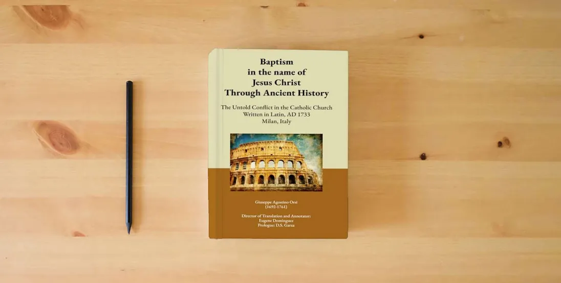 The book Baptism in the name of Jesus Christ Through Ancient History: The Untold Conflict in the Catholic Church Written in Latin, AD 1733 Milan, Italy} is on the table